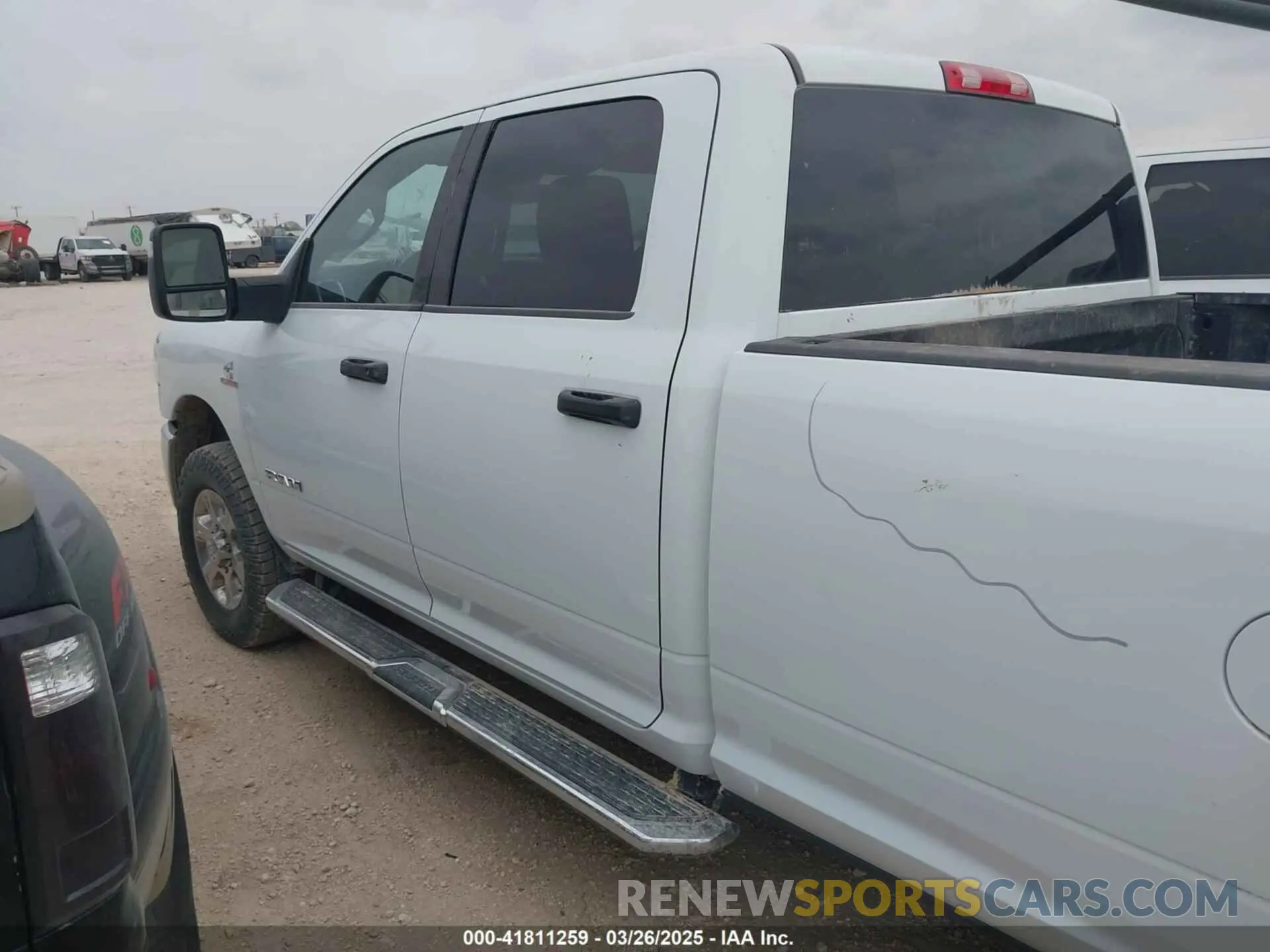 14 Photograph of a damaged car 3C63R3HL9RG165581 RAM 3500 2024