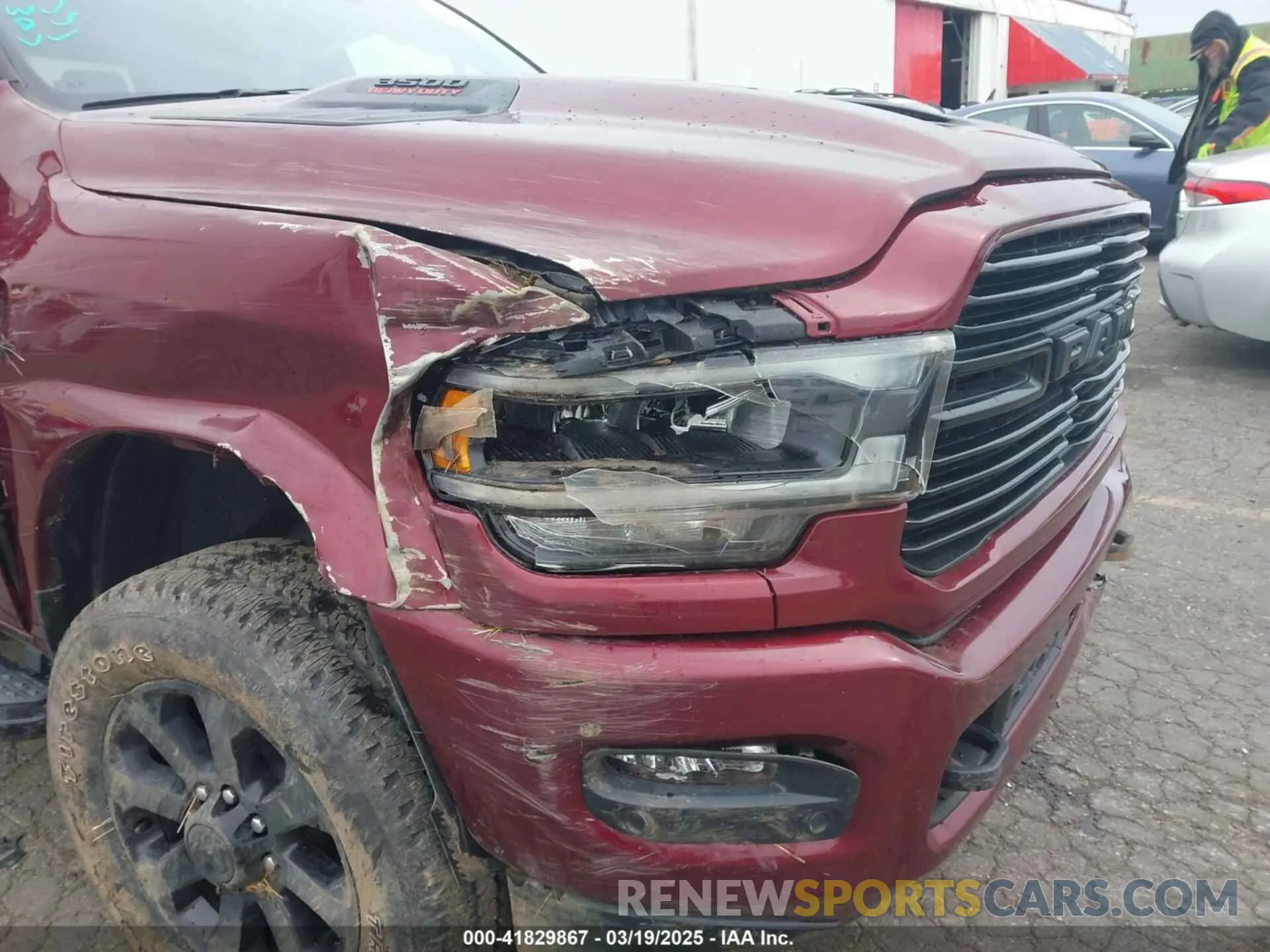 13 Photograph of a damaged car 3C63R3JL1RG265653 RAM 3500 2024