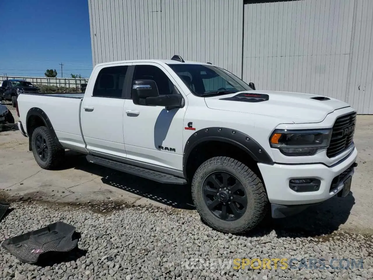 4 Photograph of a damaged car 3C63R3JL2RG265662 RAM 3500 2024