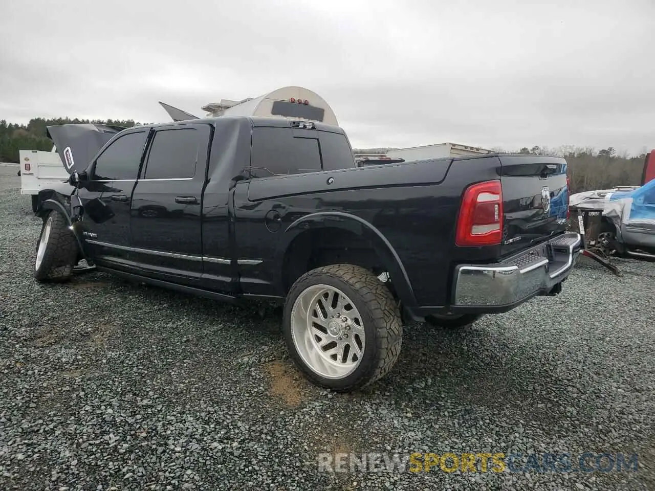 2 Photograph of a damaged car 3C63R3PL5RG151436 RAM 3500 2024