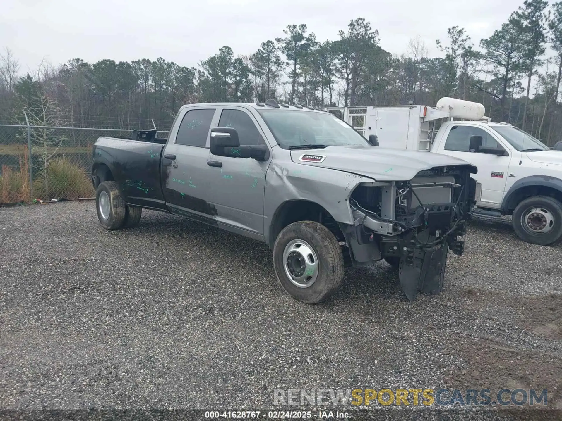 1 Photograph of a damaged car 3C63RRGJ4RG167127 RAM 3500 2024