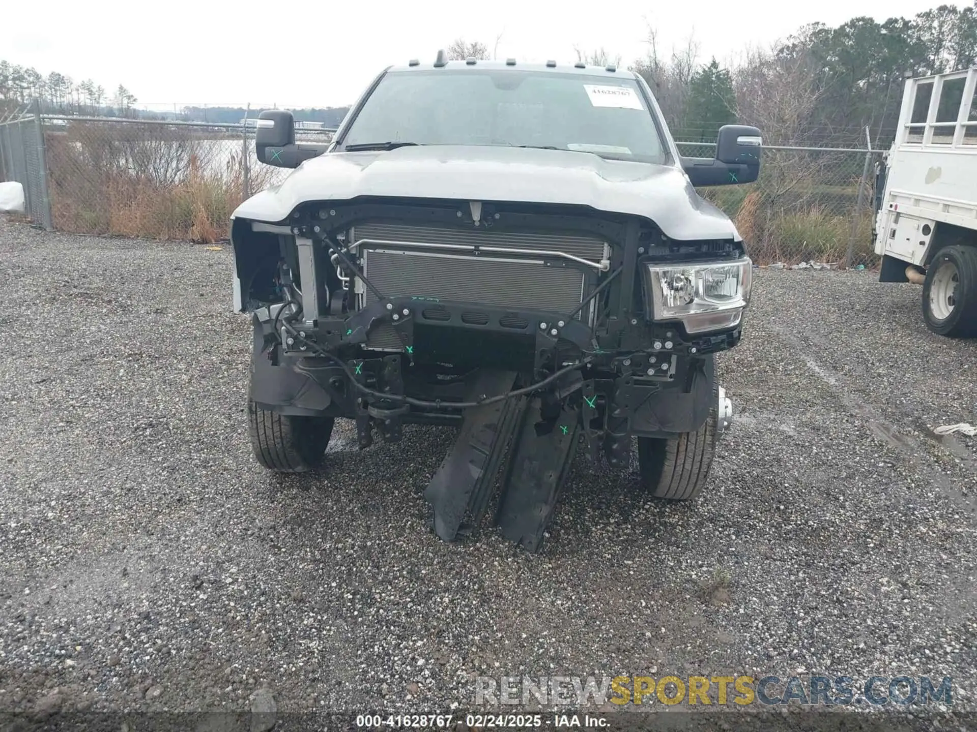 10 Photograph of a damaged car 3C63RRGJ4RG167127 RAM 3500 2024