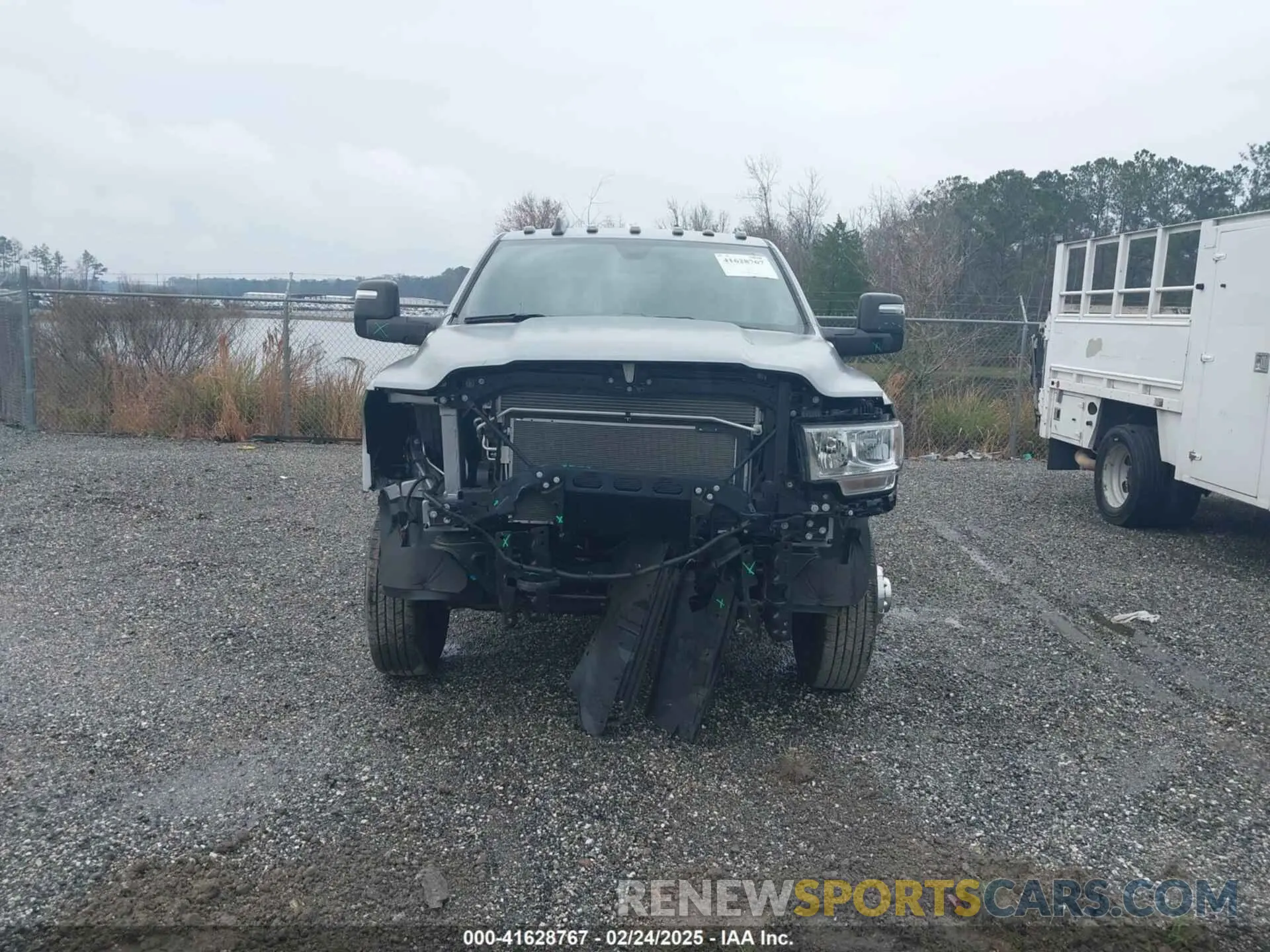 11 Photograph of a damaged car 3C63RRGJ4RG167127 RAM 3500 2024