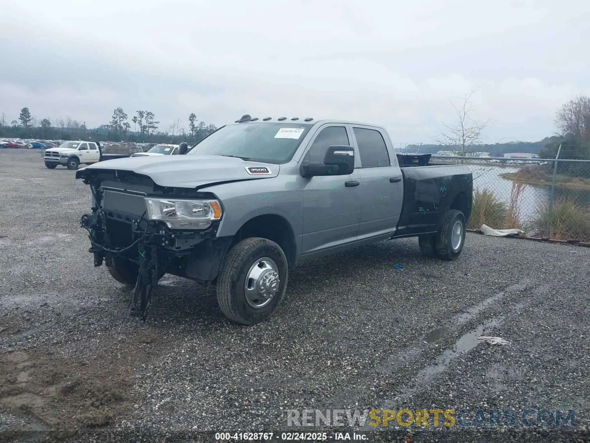 2 Photograph of a damaged car 3C63RRGJ4RG167127 RAM 3500 2024