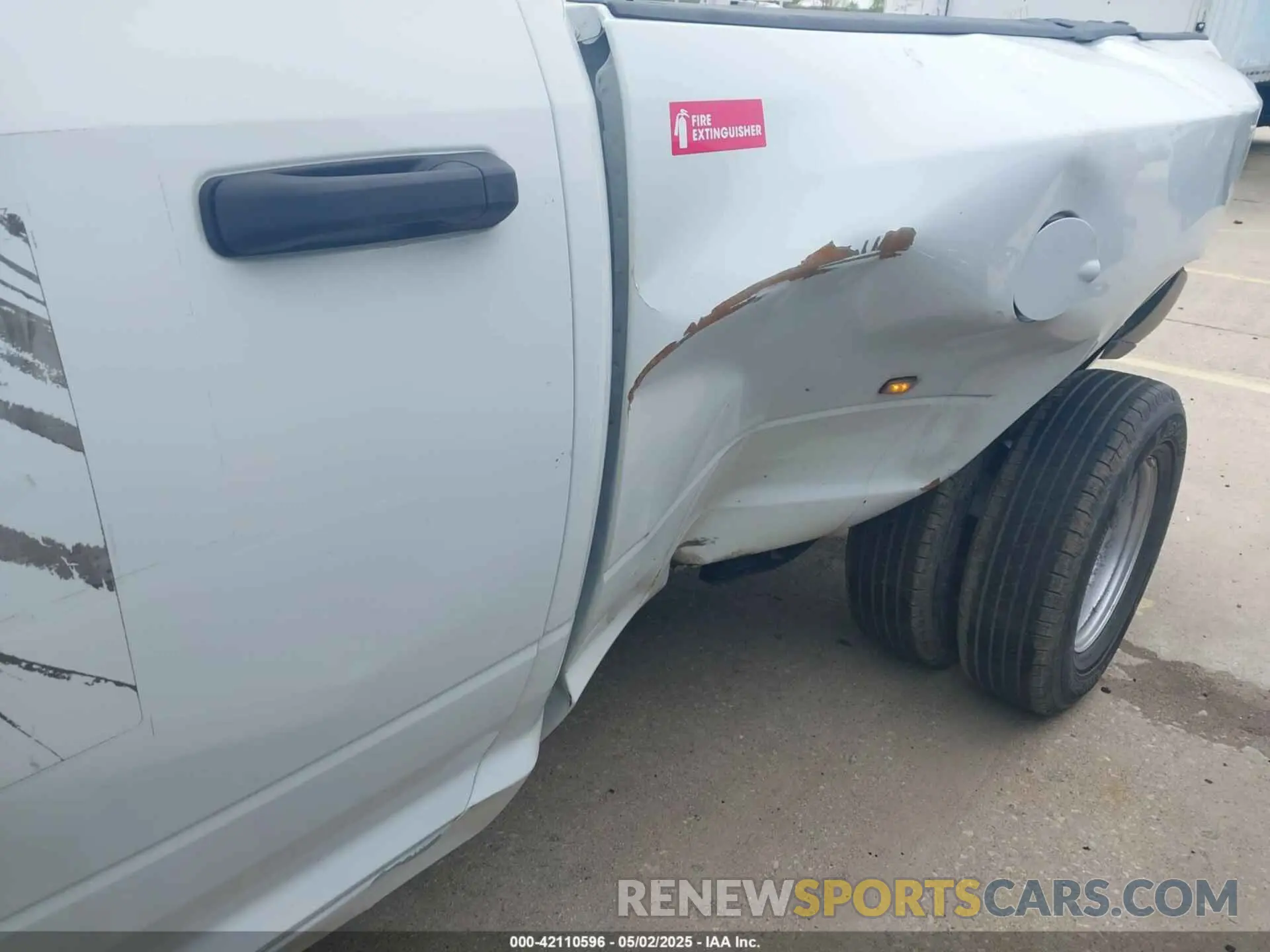 11 Photograph of a damaged car 3C63RRGL1RG256168 RAM 3500 2024