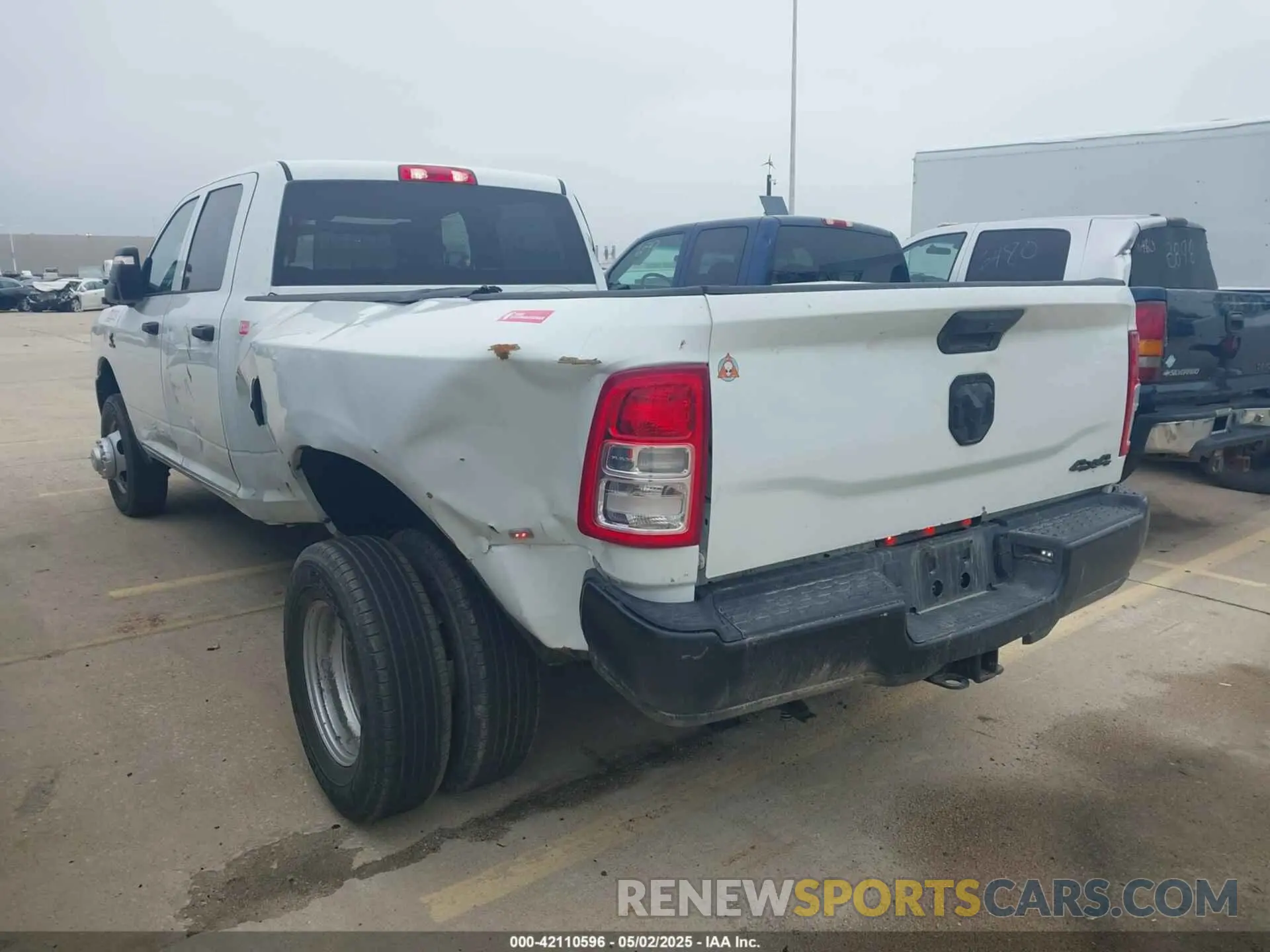 3 Photograph of a damaged car 3C63RRGL1RG256168 RAM 3500 2024