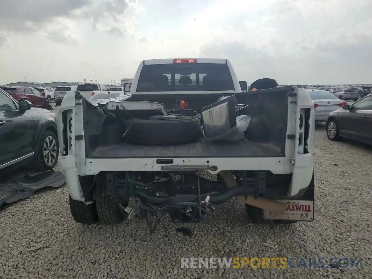 6 Photograph of a damaged car 3C63RRGL2RG198927 RAM 3500 2024