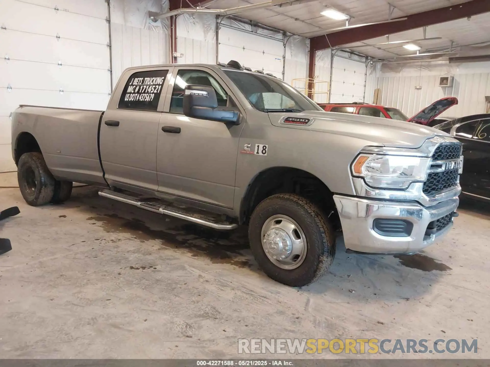 1 Photograph of a damaged car 3C63RRGL3RG289768 RAM 3500 2024