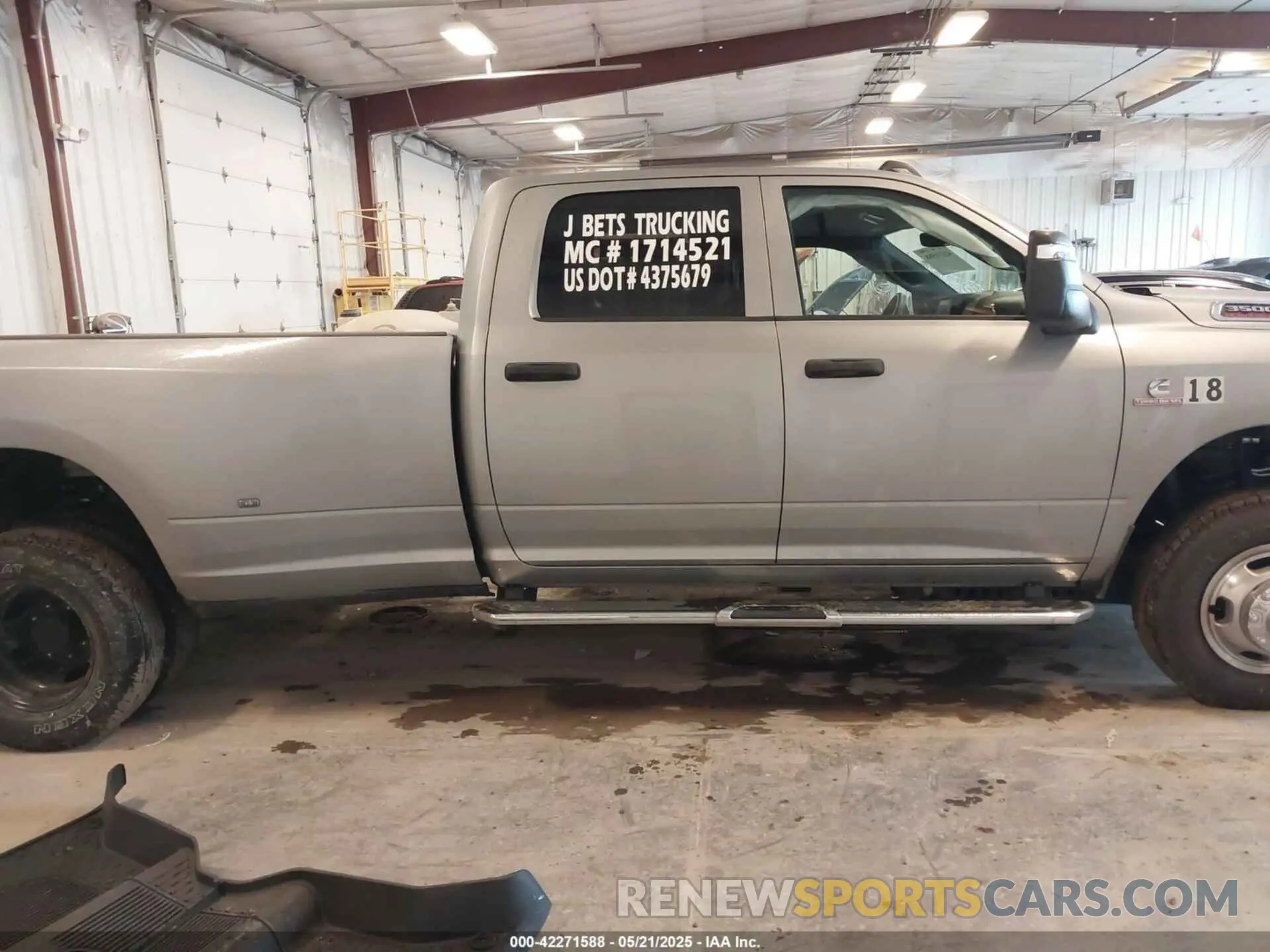 13 Photograph of a damaged car 3C63RRGL3RG289768 RAM 3500 2024