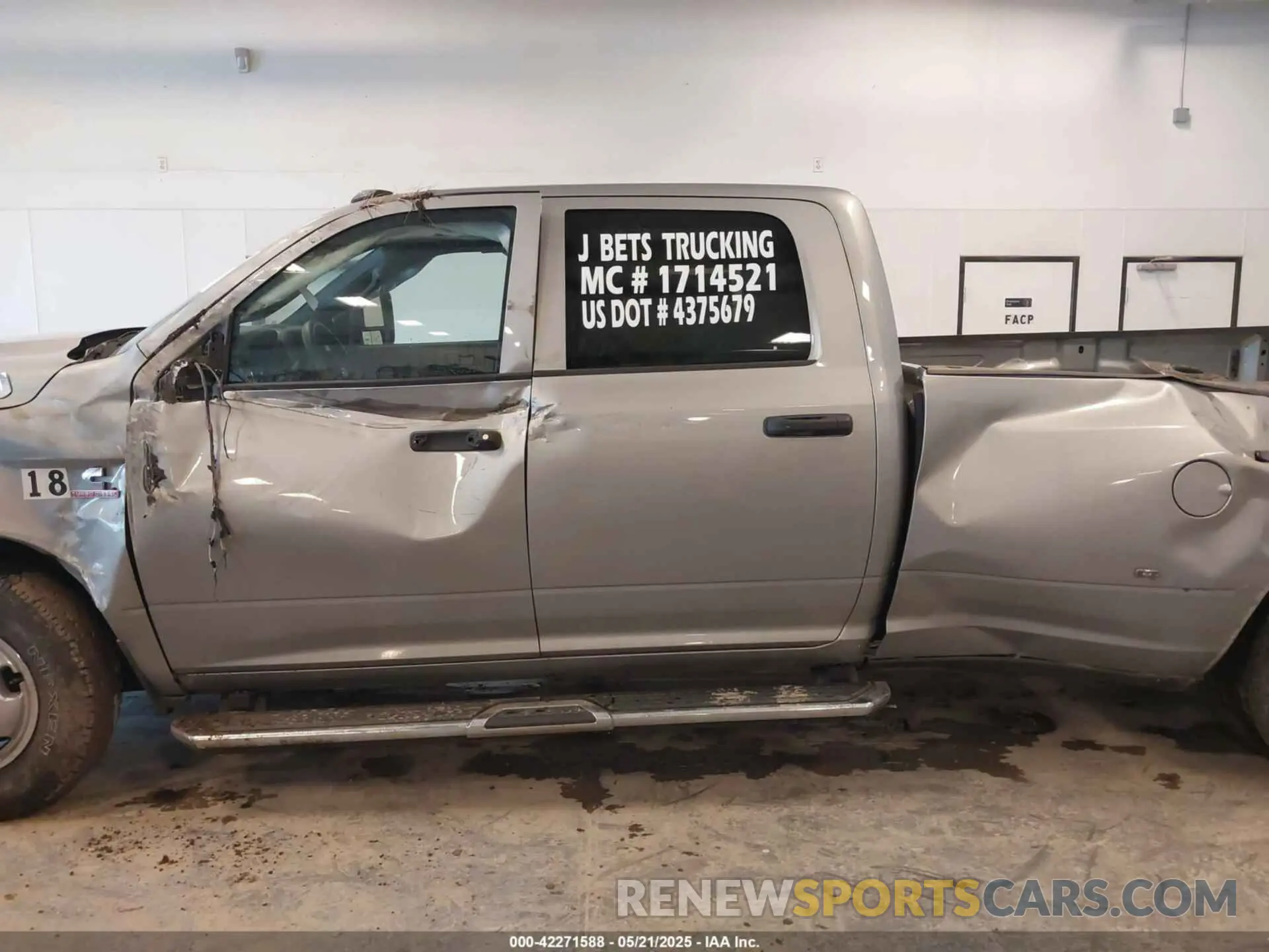 14 Photograph of a damaged car 3C63RRGL3RG289768 RAM 3500 2024