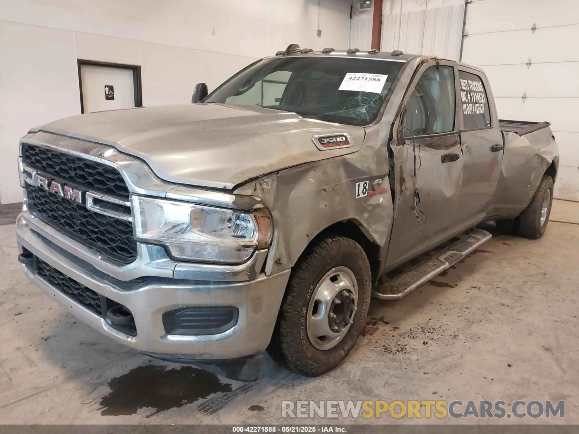 2 Photograph of a damaged car 3C63RRGL3RG289768 RAM 3500 2024
