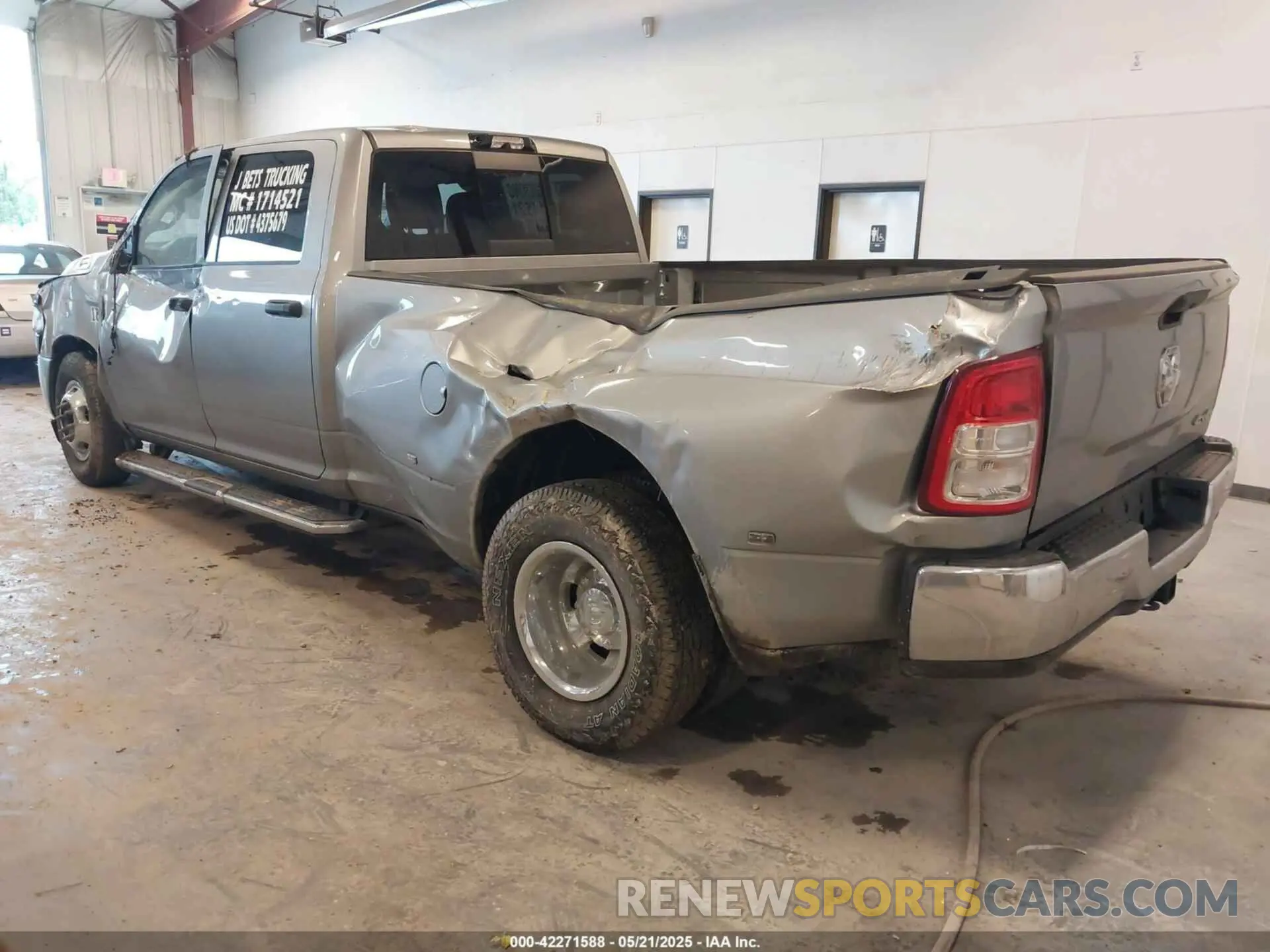 3 Photograph of a damaged car 3C63RRGL3RG289768 RAM 3500 2024