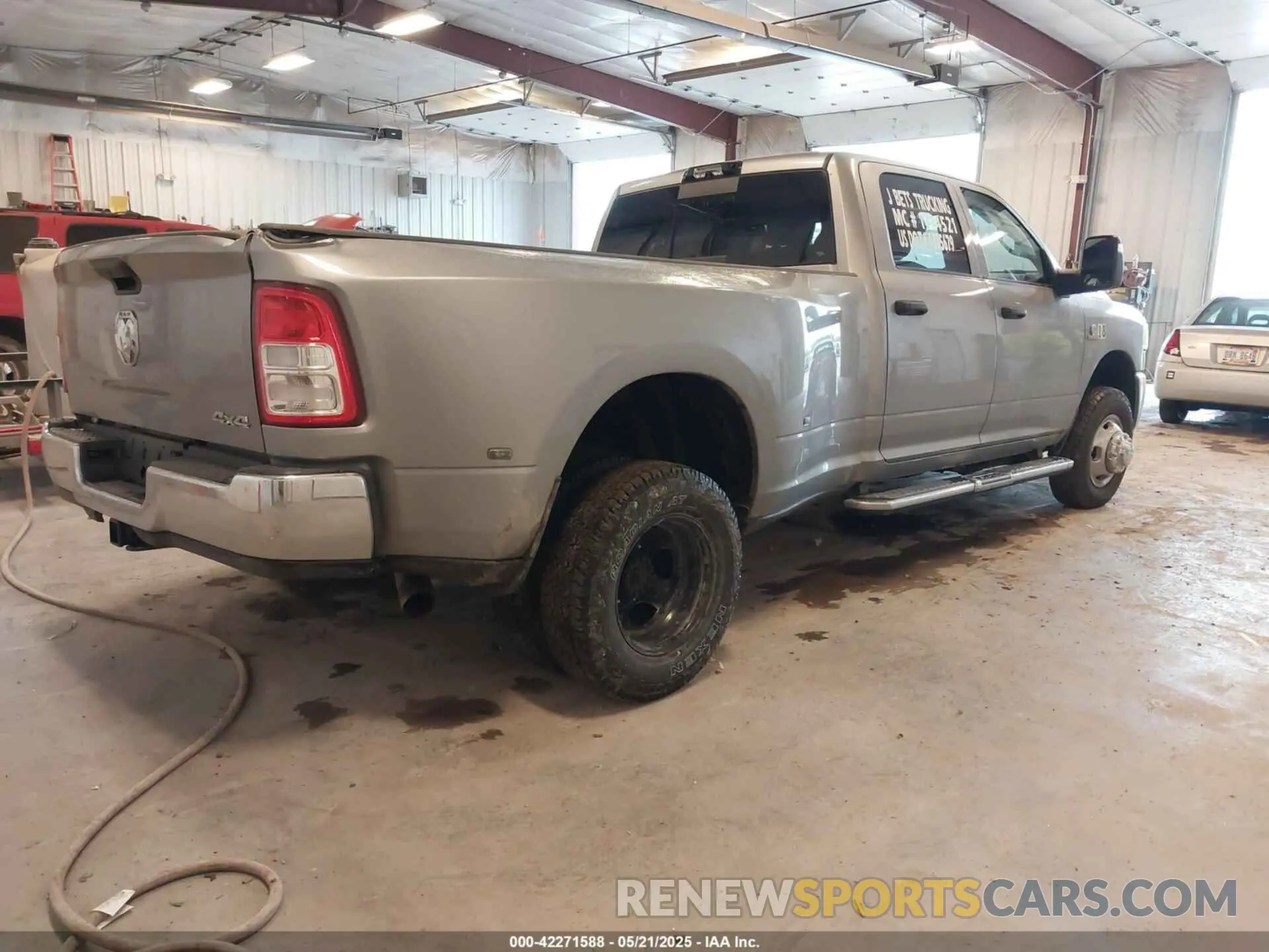 4 Photograph of a damaged car 3C63RRGL3RG289768 RAM 3500 2024
