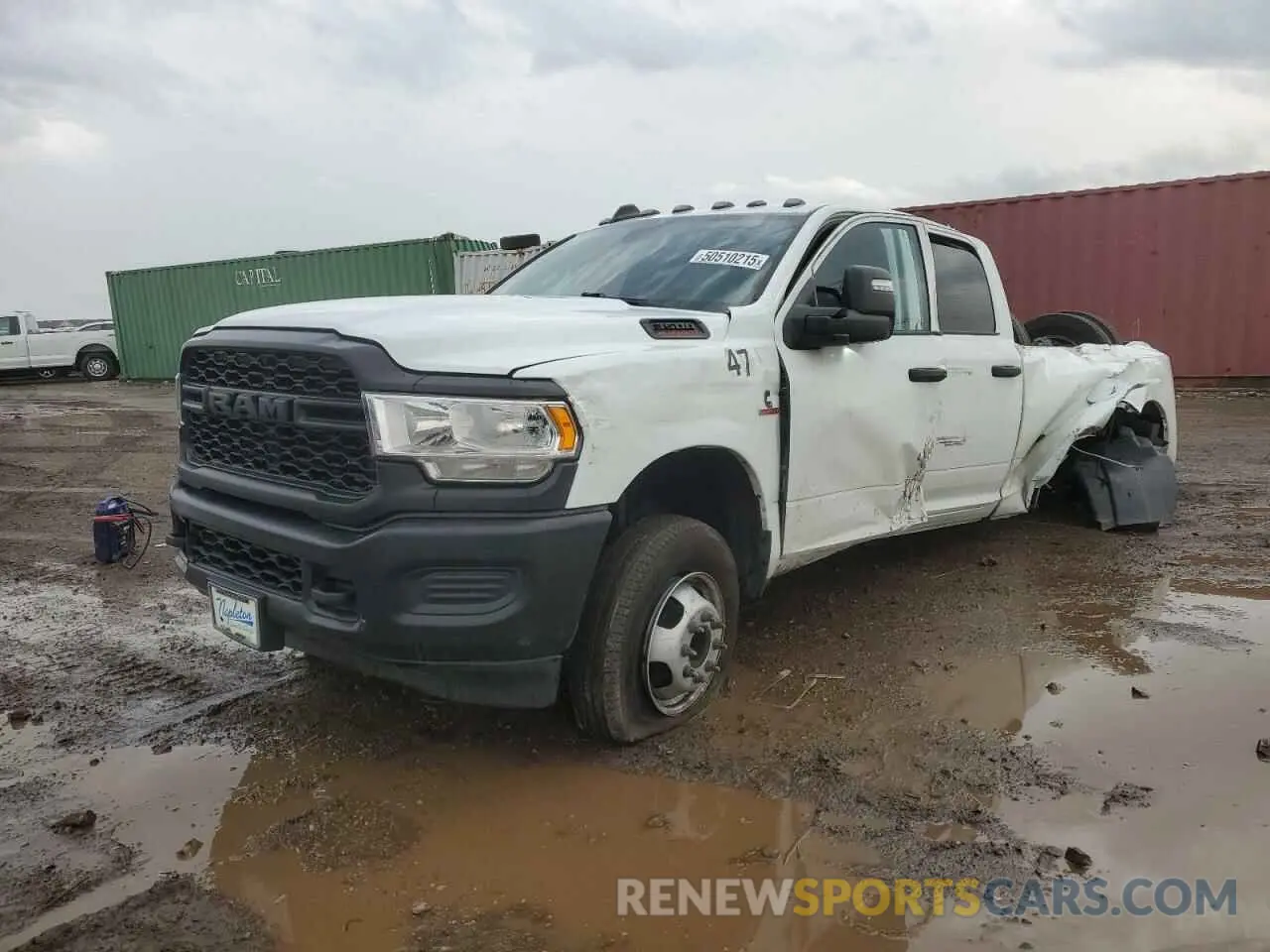 1 Photograph of a damaged car 3C63RRGL3RG295327 RAM 3500 2024