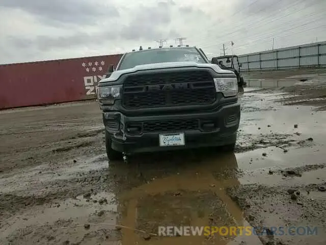 11 Photograph of a damaged car 3C63RRGL3RG295327 RAM 3500 2024