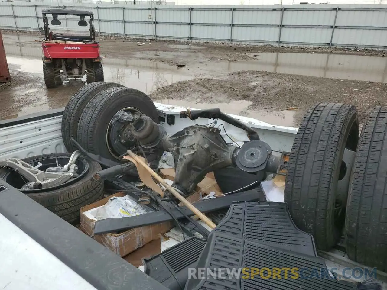 14 Photograph of a damaged car 3C63RRGL3RG295327 RAM 3500 2024