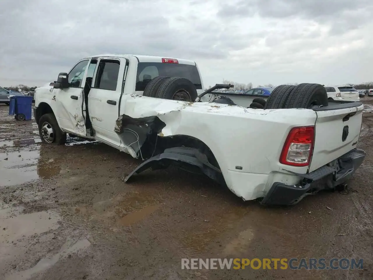 2 Photograph of a damaged car 3C63RRGL3RG295327 RAM 3500 2024