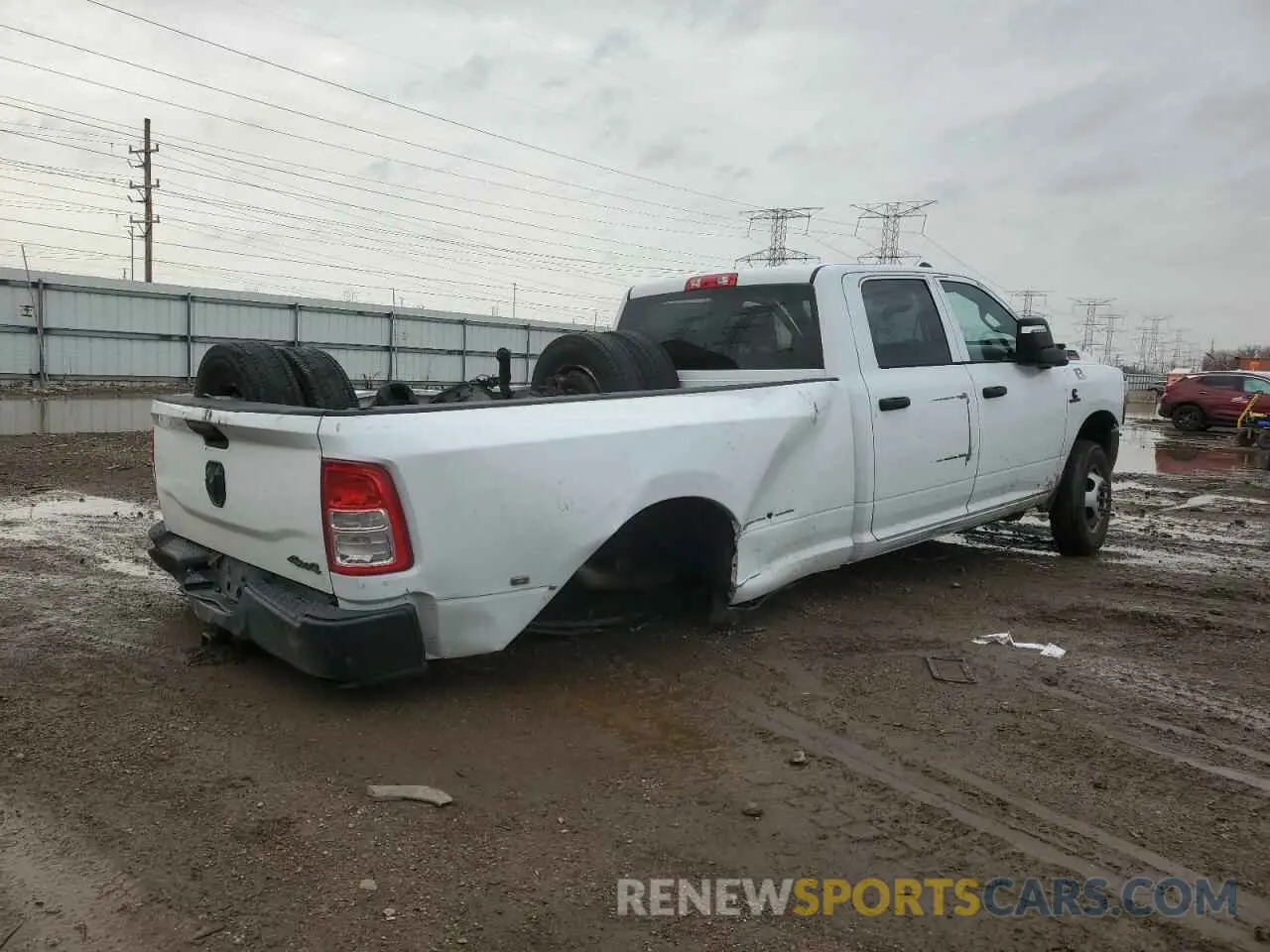 3 Photograph of a damaged car 3C63RRGL3RG295327 RAM 3500 2024