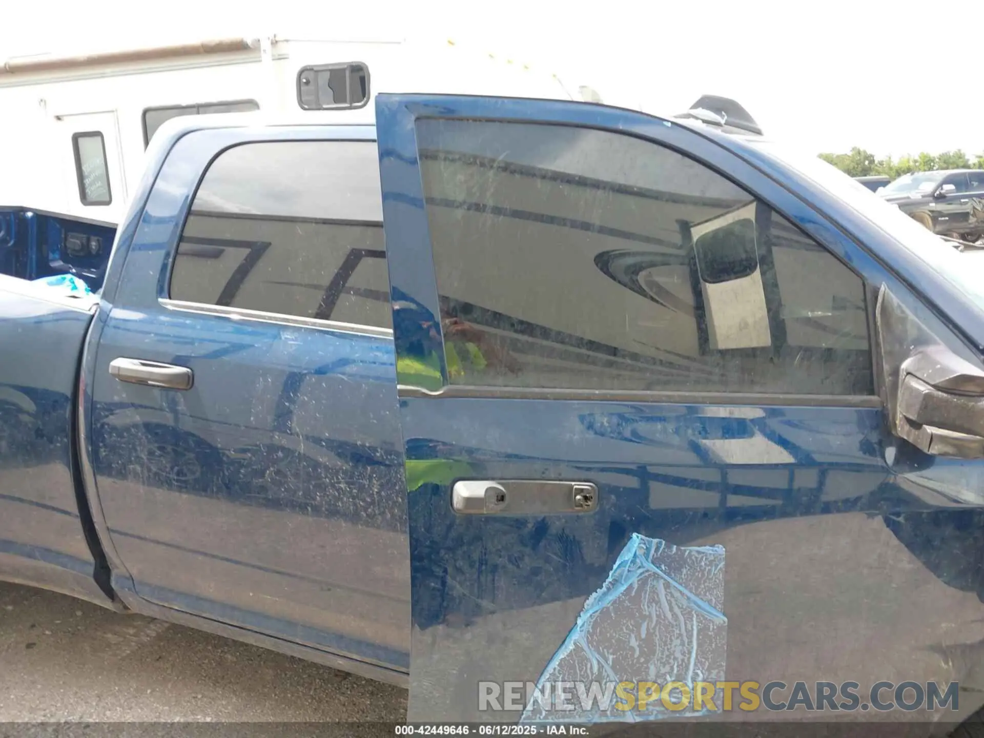 13 Photograph of a damaged car 3C63RRGL3RG339617 RAM 3500 2024