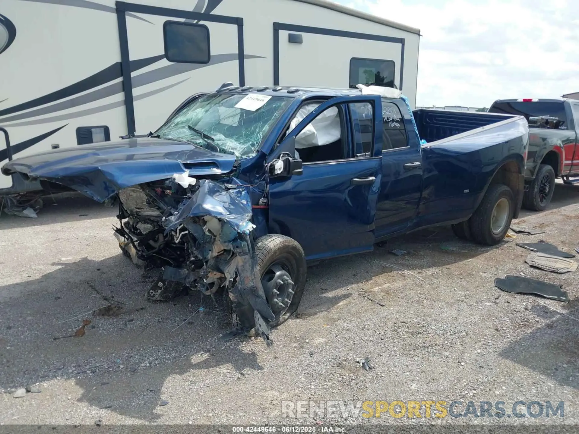 2 Photograph of a damaged car 3C63RRGL3RG339617 RAM 3500 2024