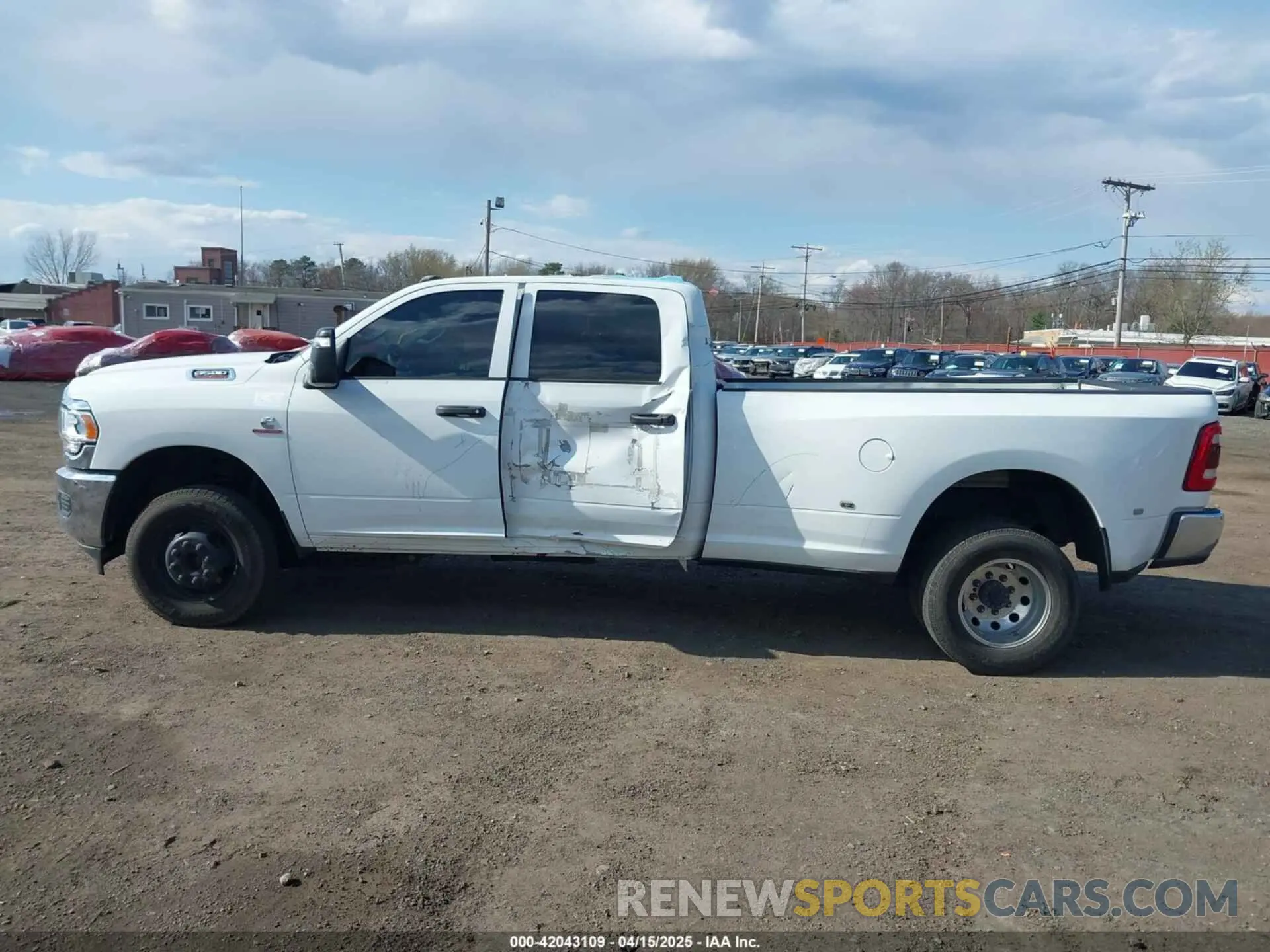 14 Photograph of a damaged car 3C63RRGL4RG274194 RAM 3500 2024