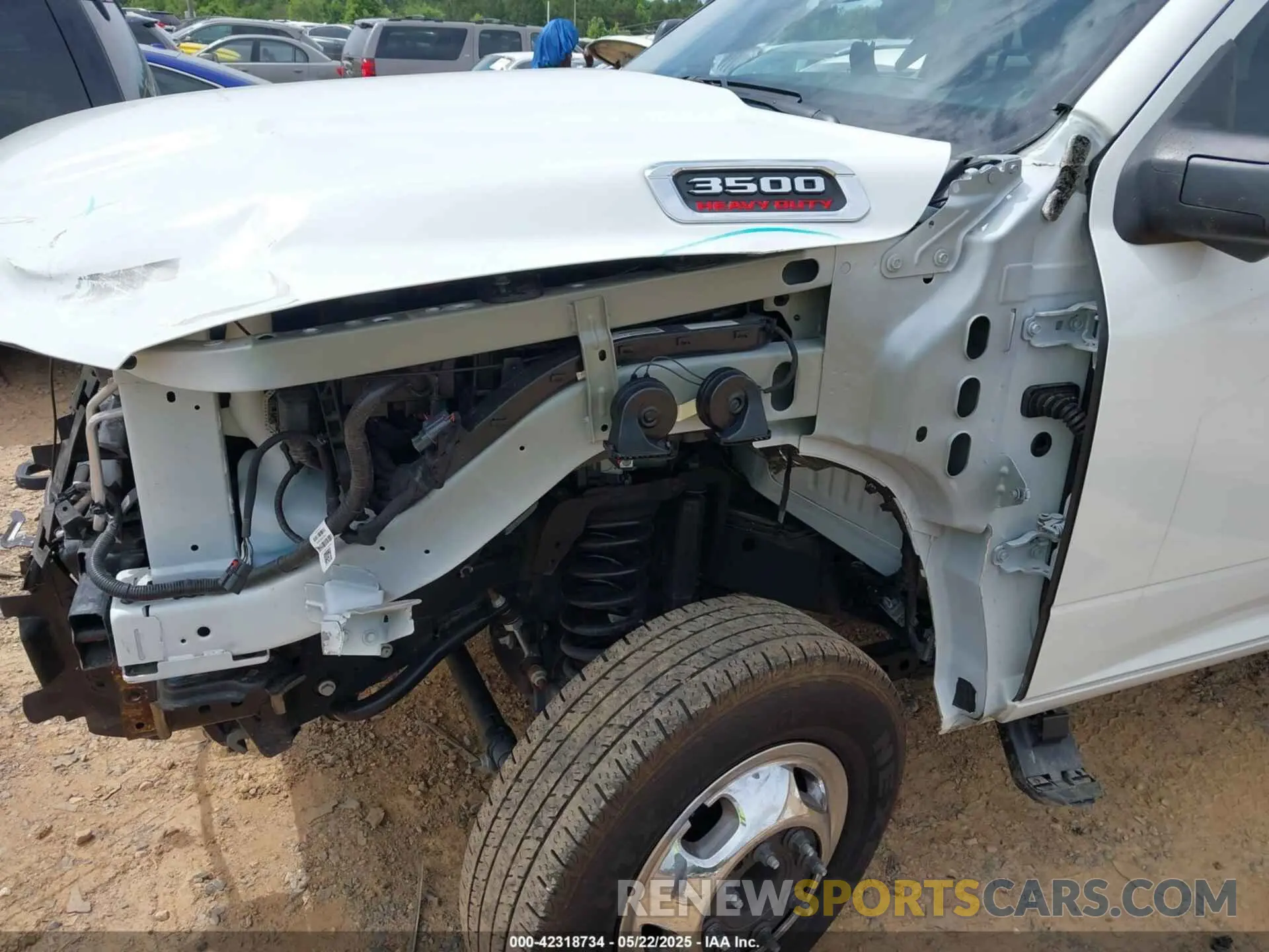 12 Photograph of a damaged car 3C63RRGL6RG307826 RAM 3500 2024