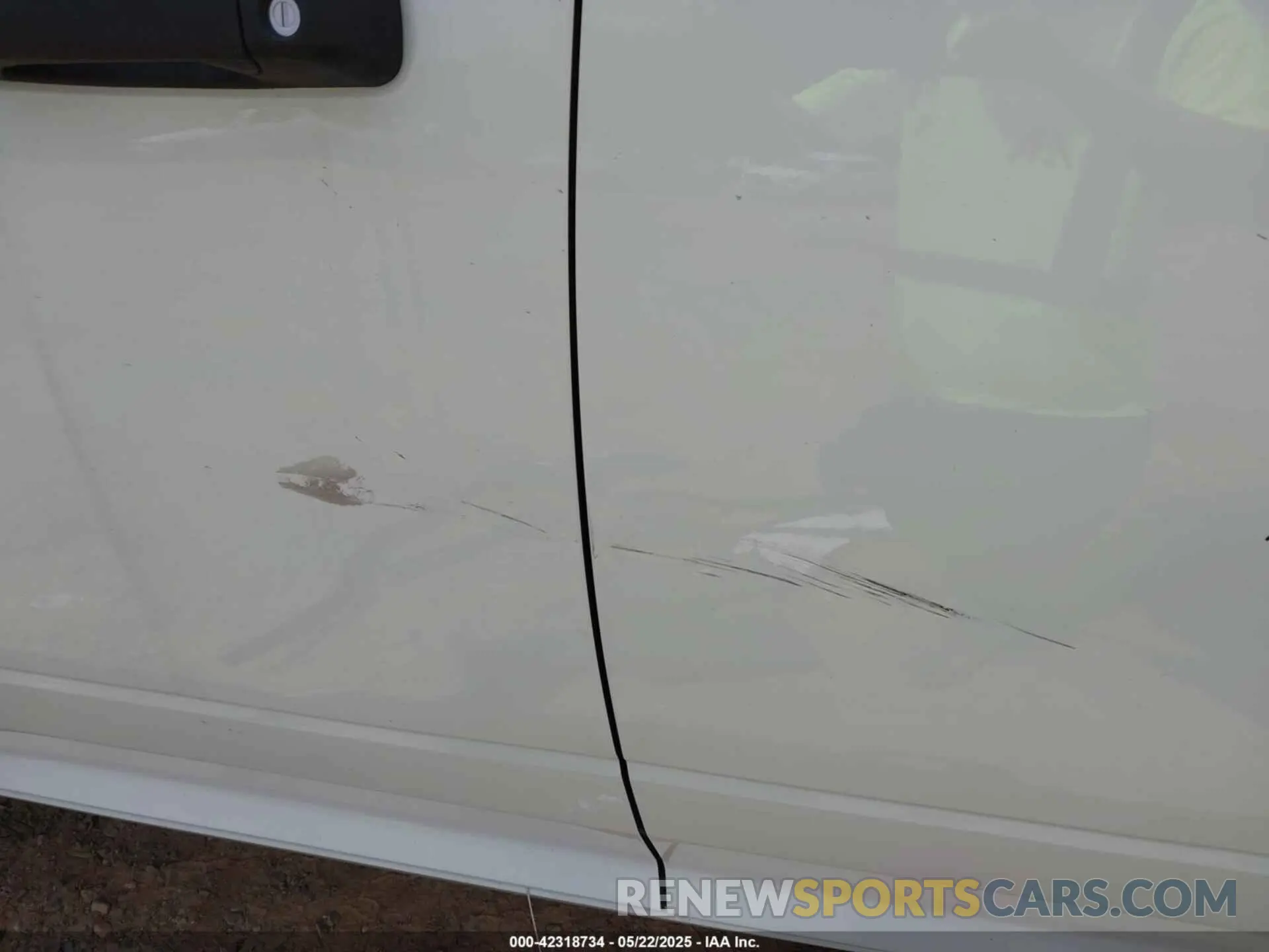 14 Photograph of a damaged car 3C63RRGL6RG307826 RAM 3500 2024