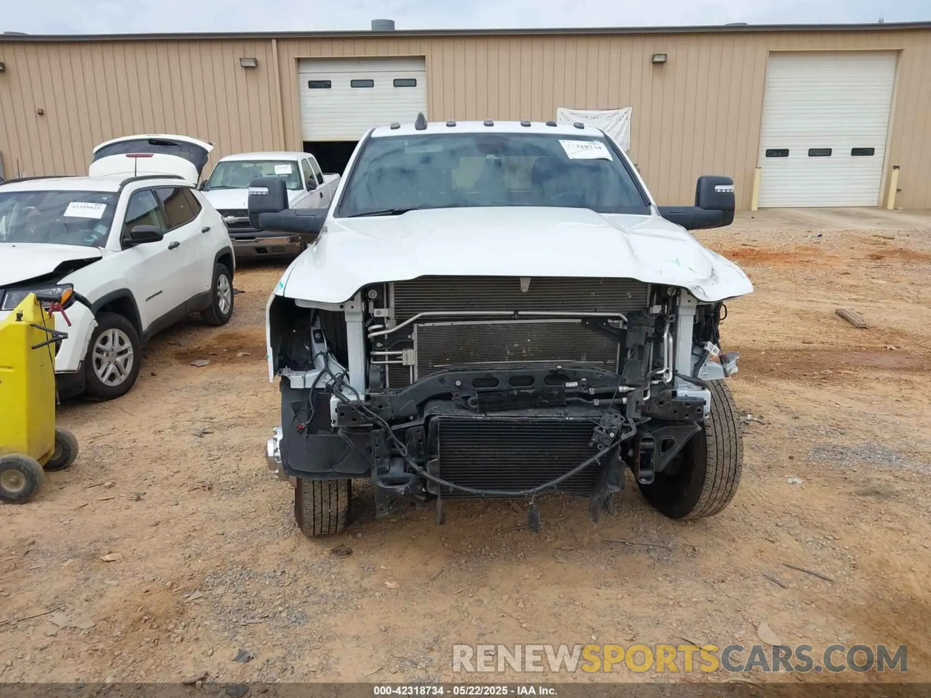 15 Photograph of a damaged car 3C63RRGL6RG307826 RAM 3500 2024