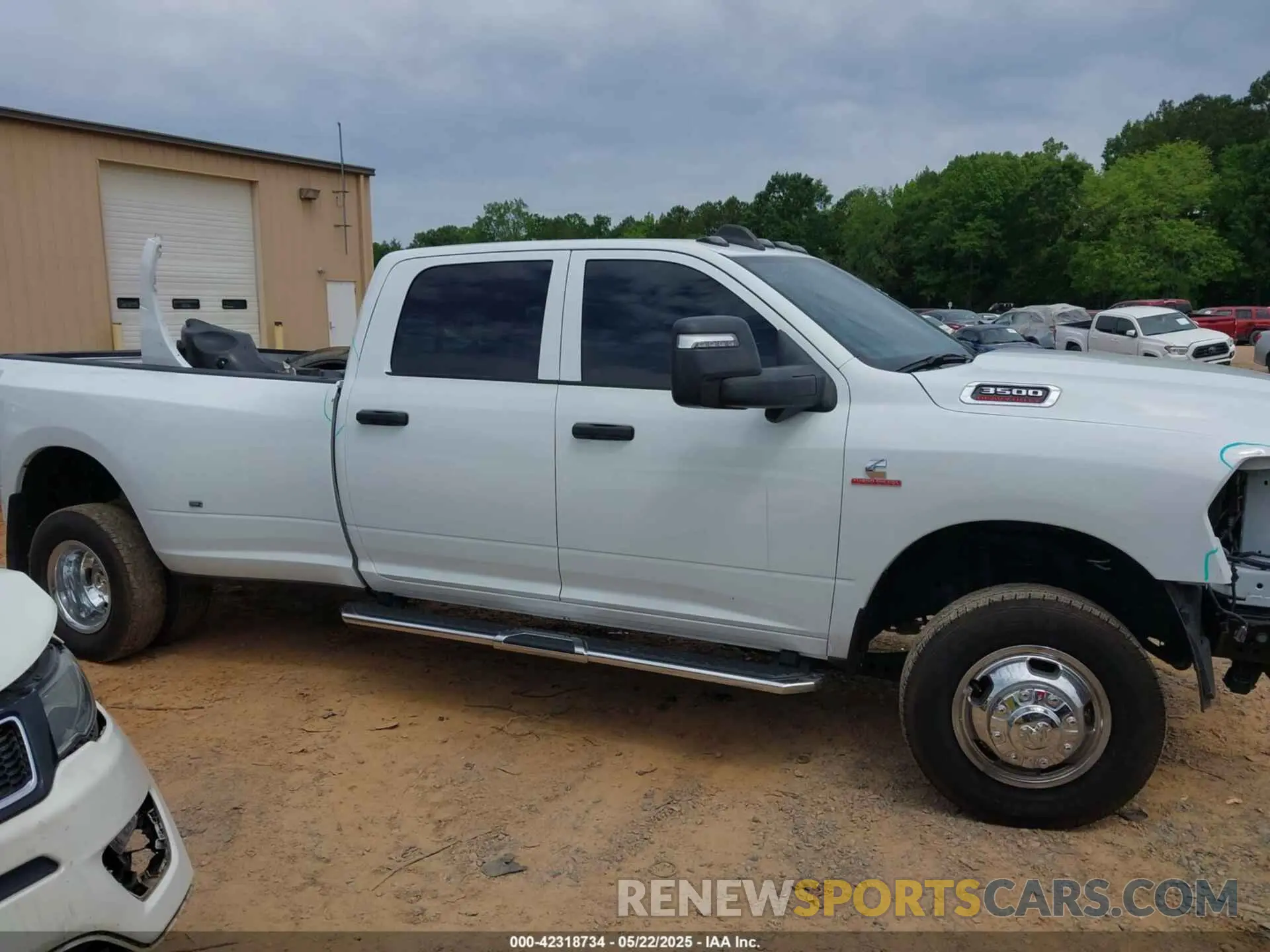 16 Photograph of a damaged car 3C63RRGL6RG307826 RAM 3500 2024