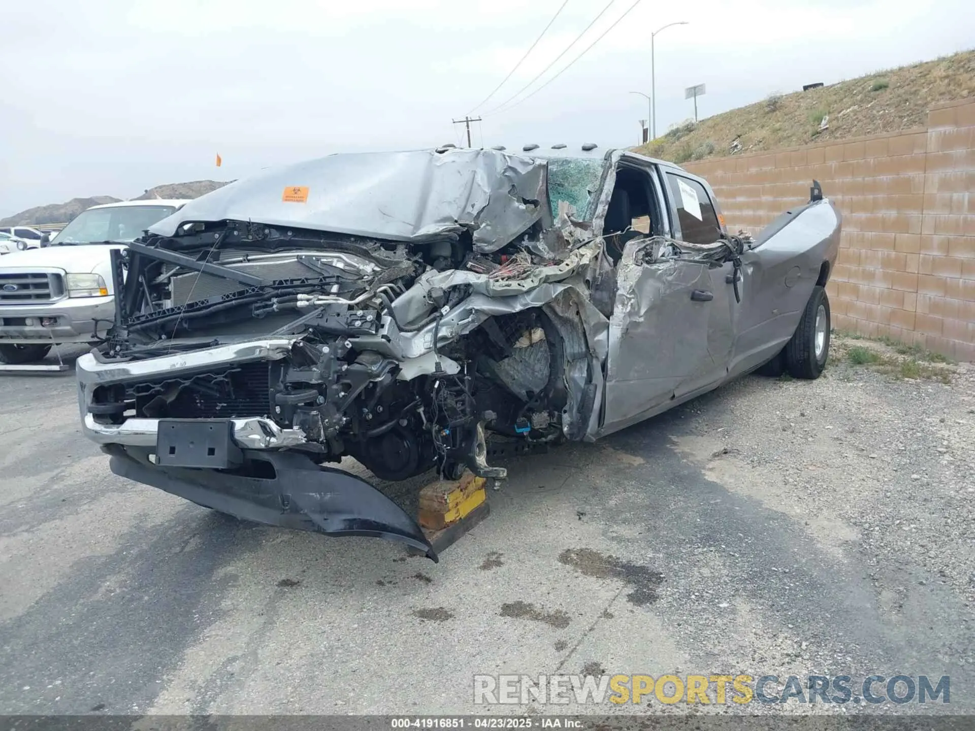 2 Photograph of a damaged car 3C63RRGL7RG321265 RAM 3500 2024