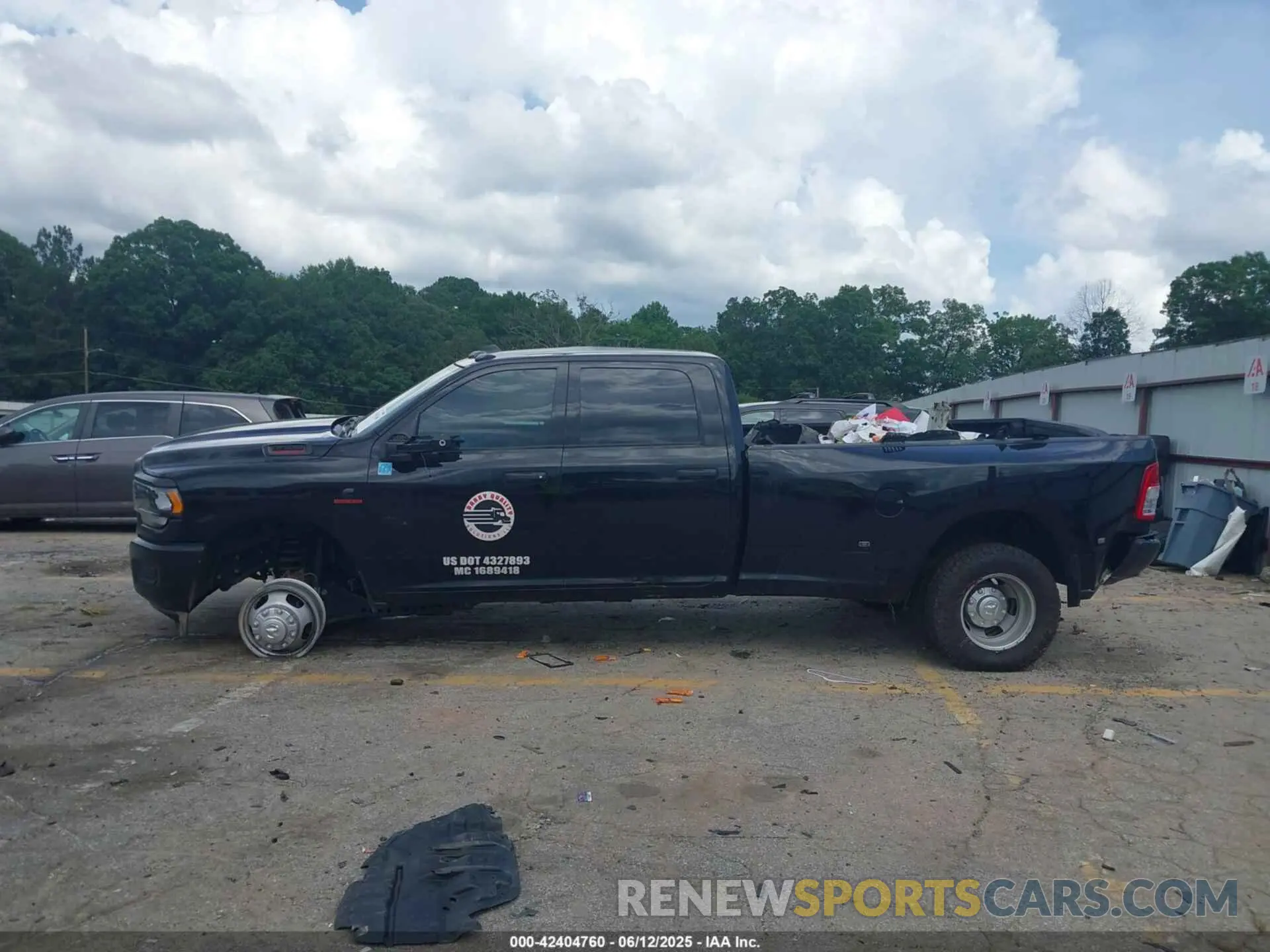 14 Photograph of a damaged car 3C63RRGL7RG362480 RAM 3500 2024