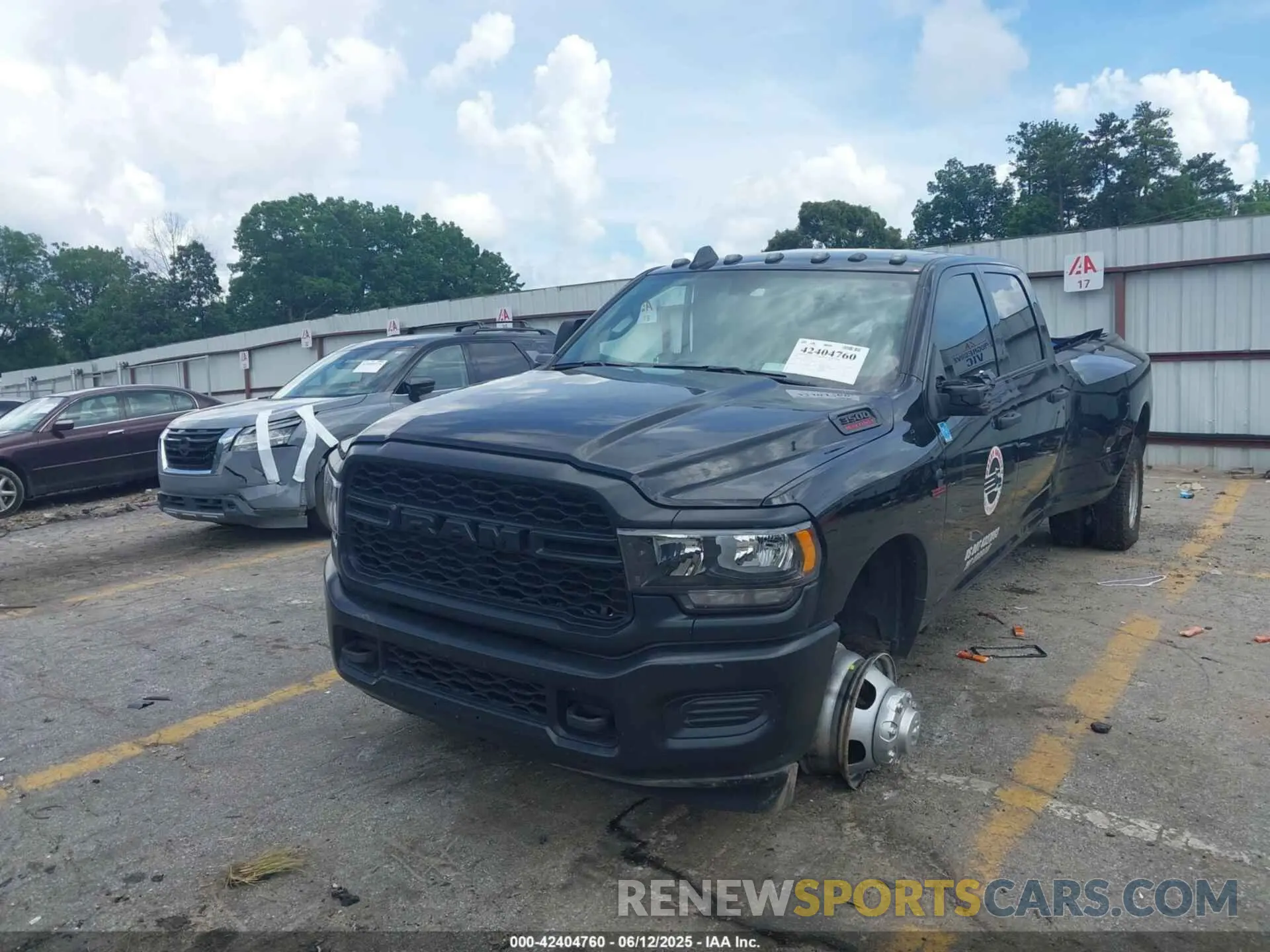 2 Photograph of a damaged car 3C63RRGL7RG362480 RAM 3500 2024