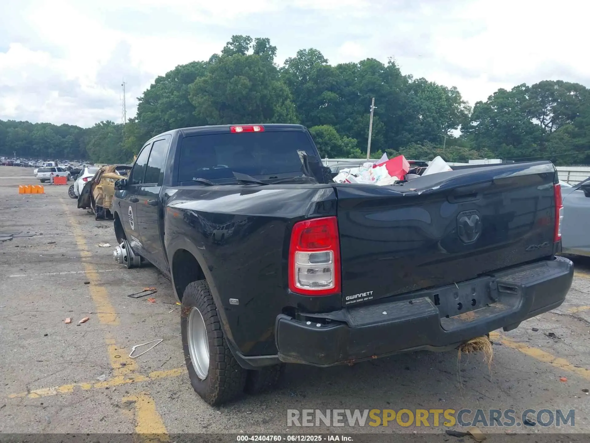 3 Photograph of a damaged car 3C63RRGL7RG362480 RAM 3500 2024