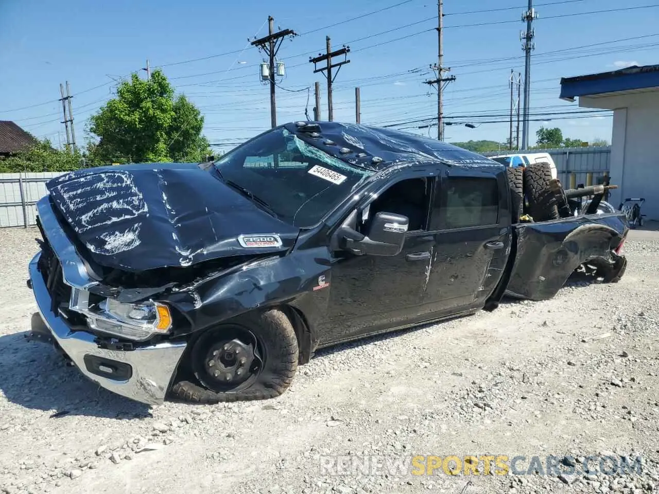 1 Photograph of a damaged car 3C63RRGLXRG242060 RAM 3500 2024