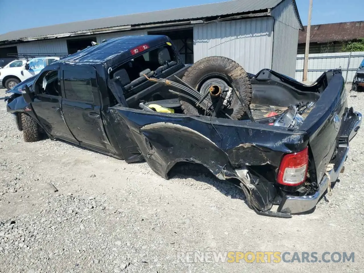 2 Photograph of a damaged car 3C63RRGLXRG242060 RAM 3500 2024