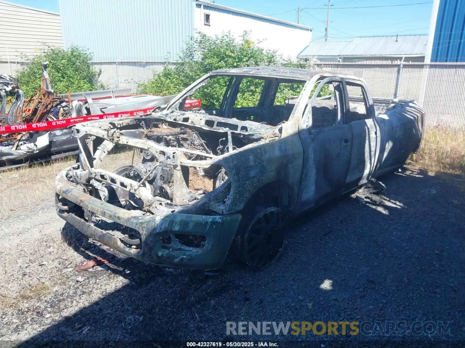2 Photograph of a damaged car 3C63RRGLXRG295194 RAM 3500 2024