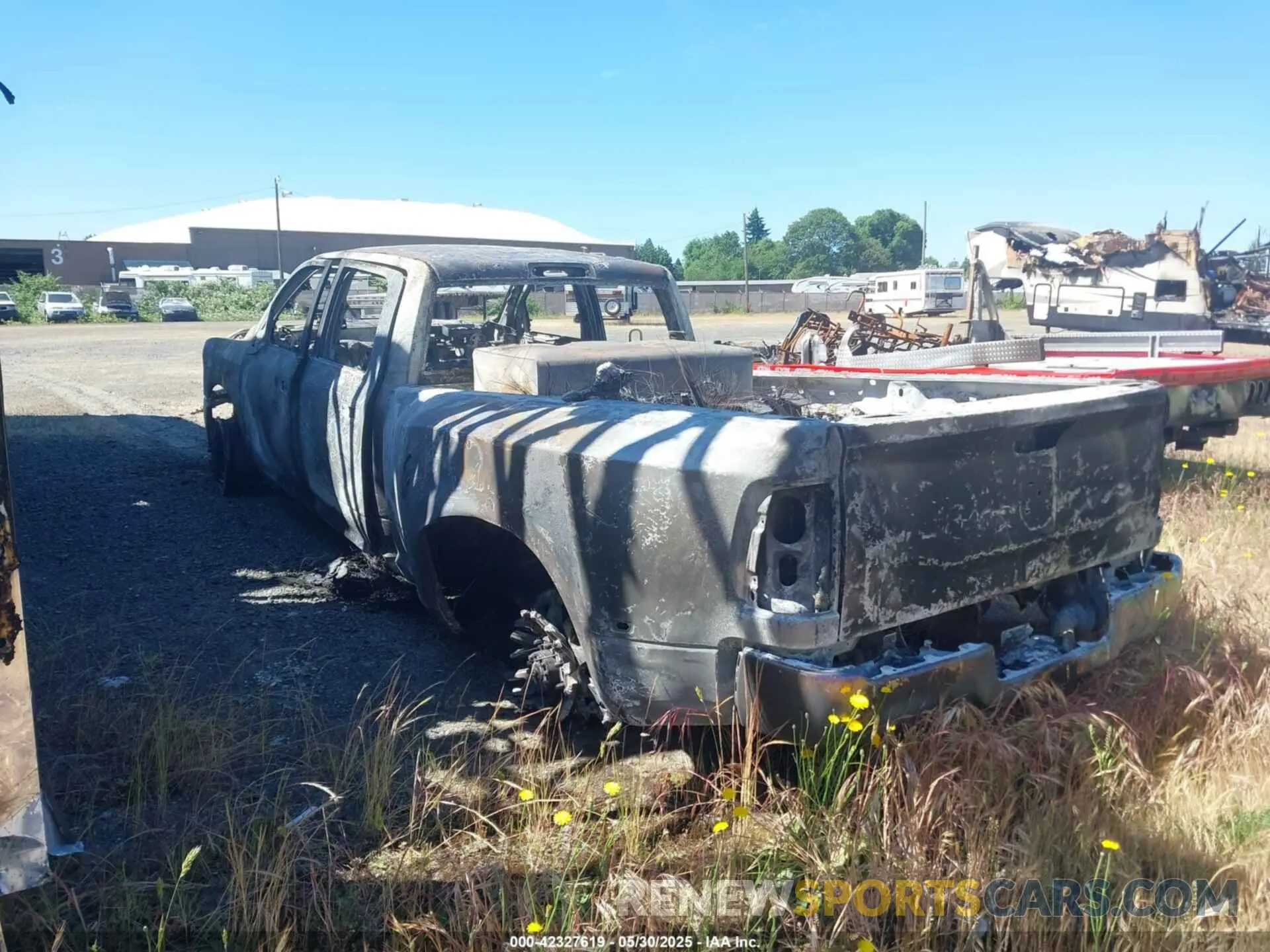 3 Photograph of a damaged car 3C63RRGLXRG295194 RAM 3500 2024