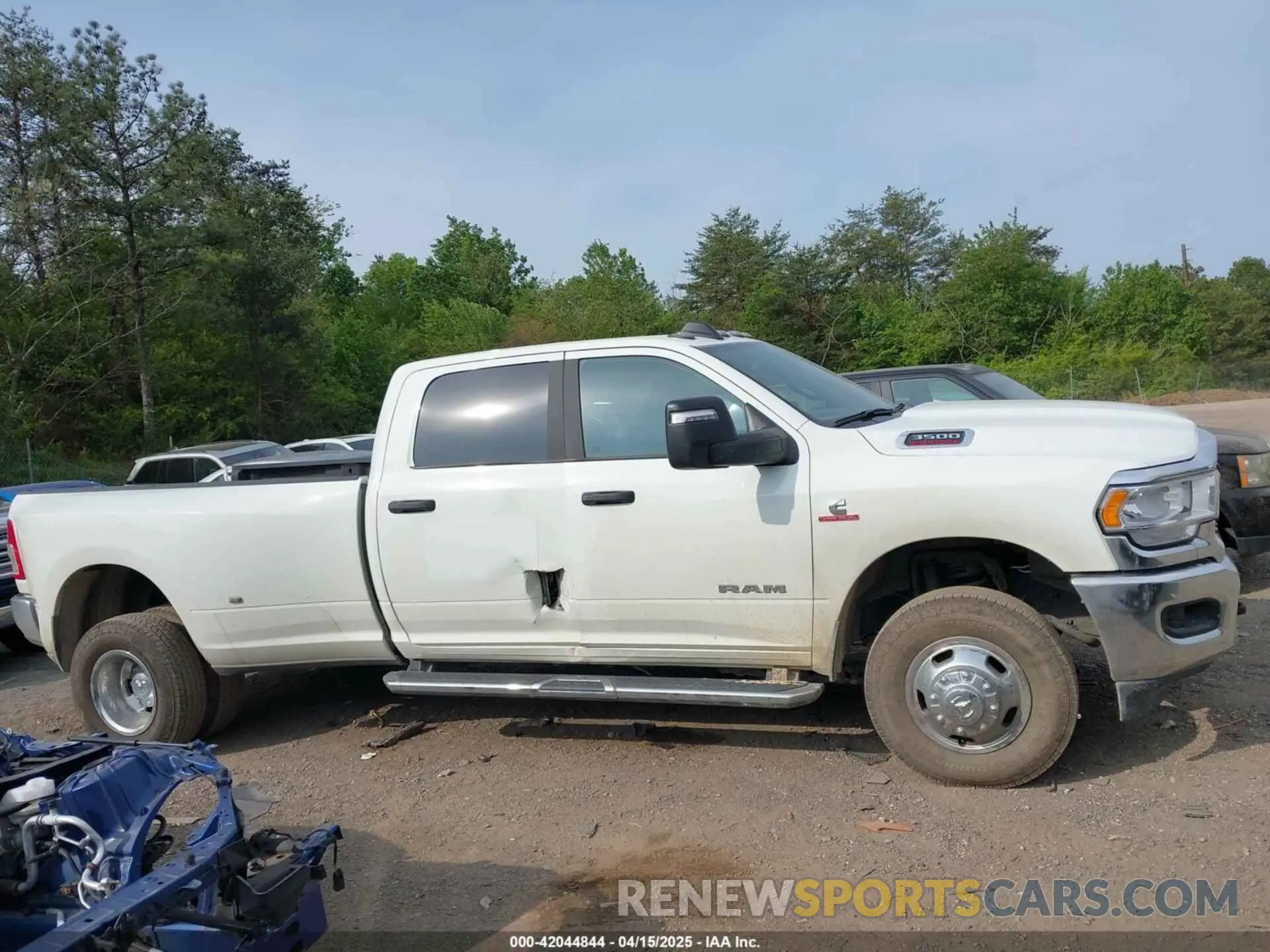 13 Photograph of a damaged car 3C63RRHL1RG271767 RAM 3500 2024