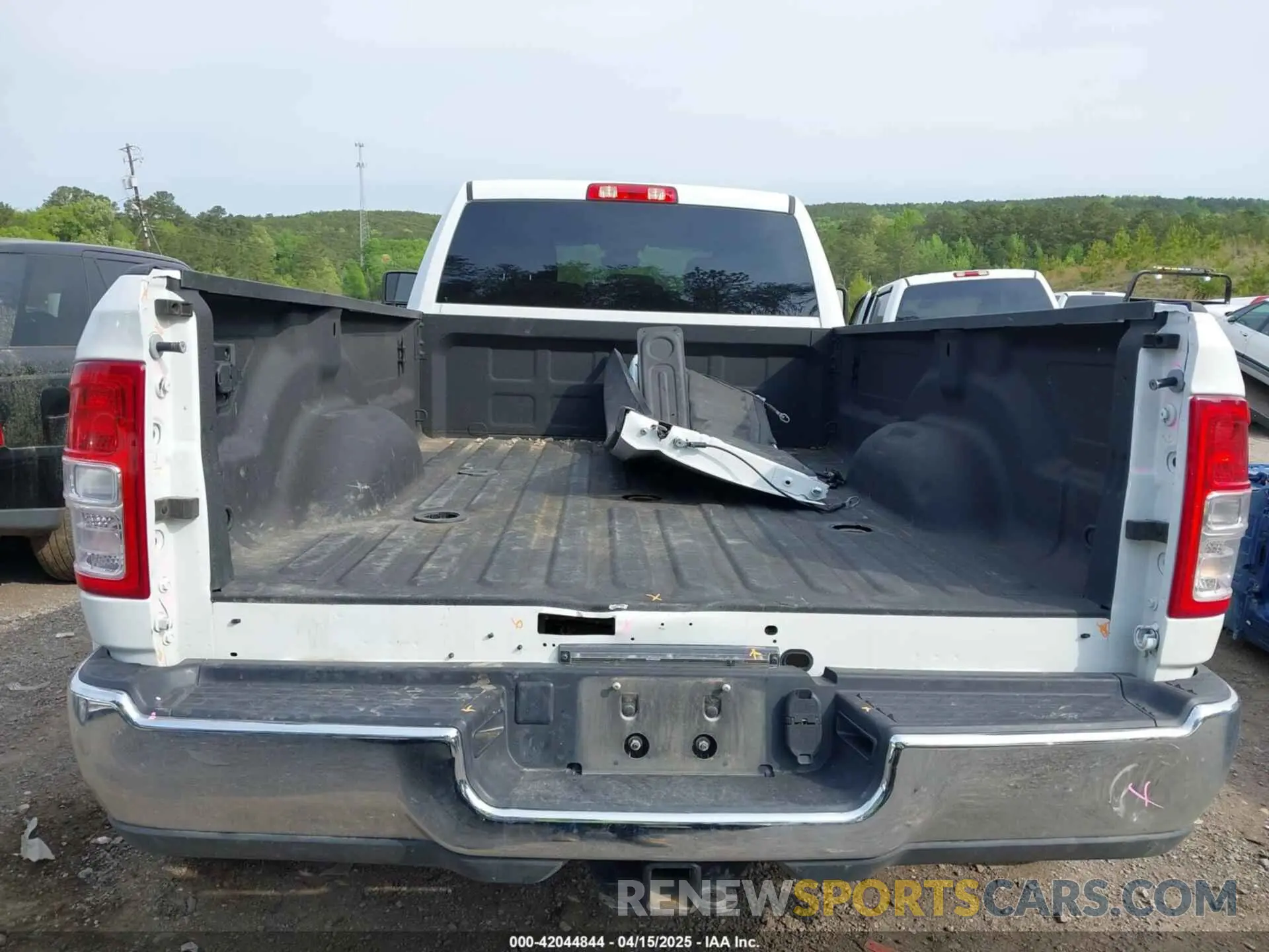 15 Photograph of a damaged car 3C63RRHL1RG271767 RAM 3500 2024
