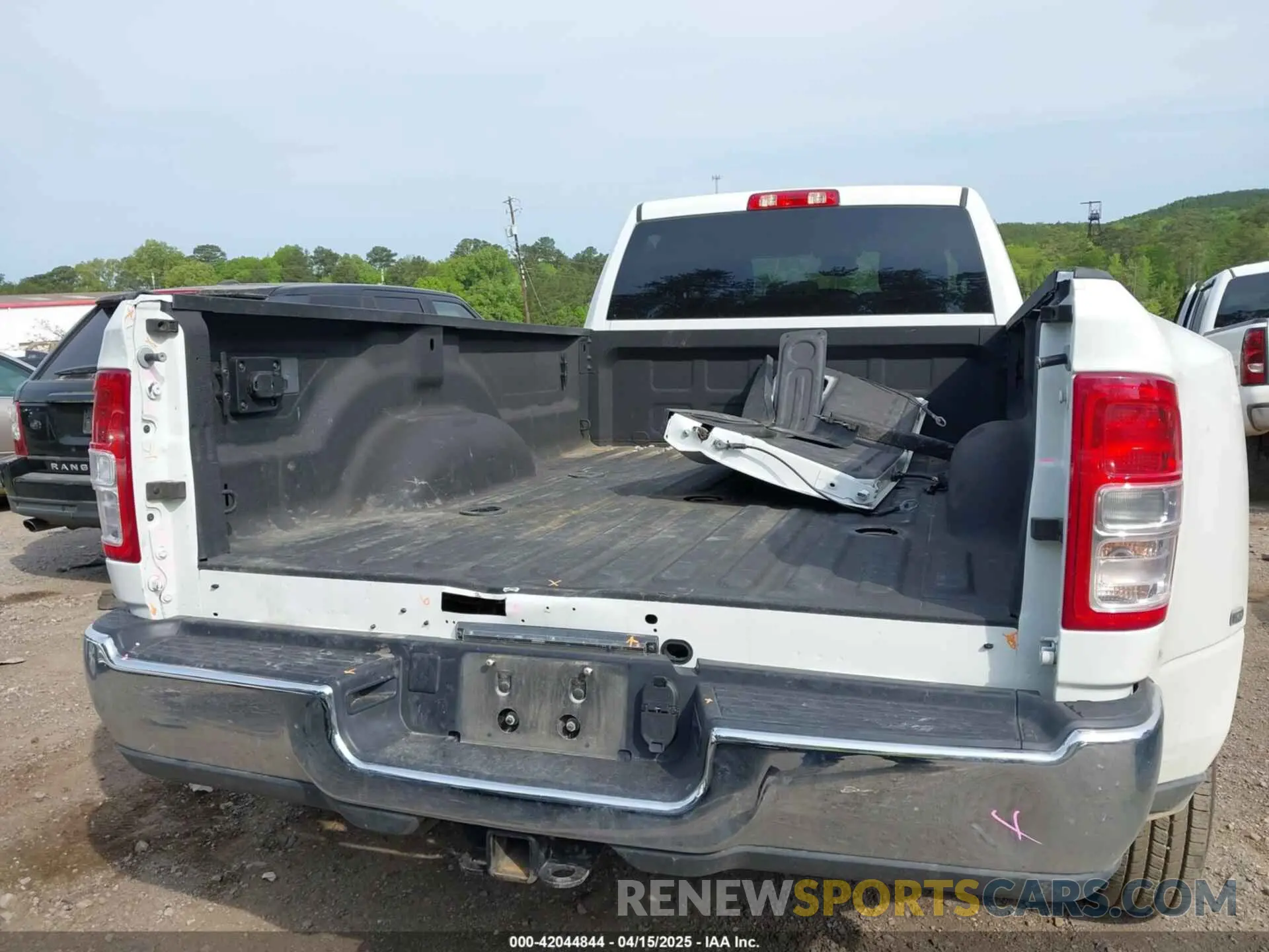 16 Photograph of a damaged car 3C63RRHL1RG271767 RAM 3500 2024