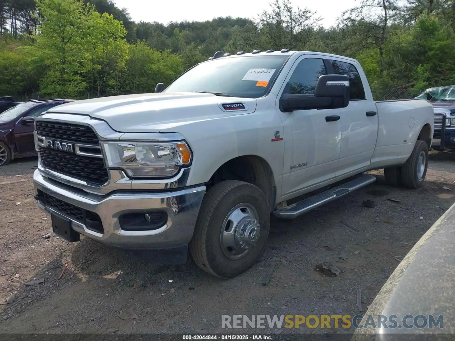 2 Photograph of a damaged car 3C63RRHL1RG271767 RAM 3500 2024