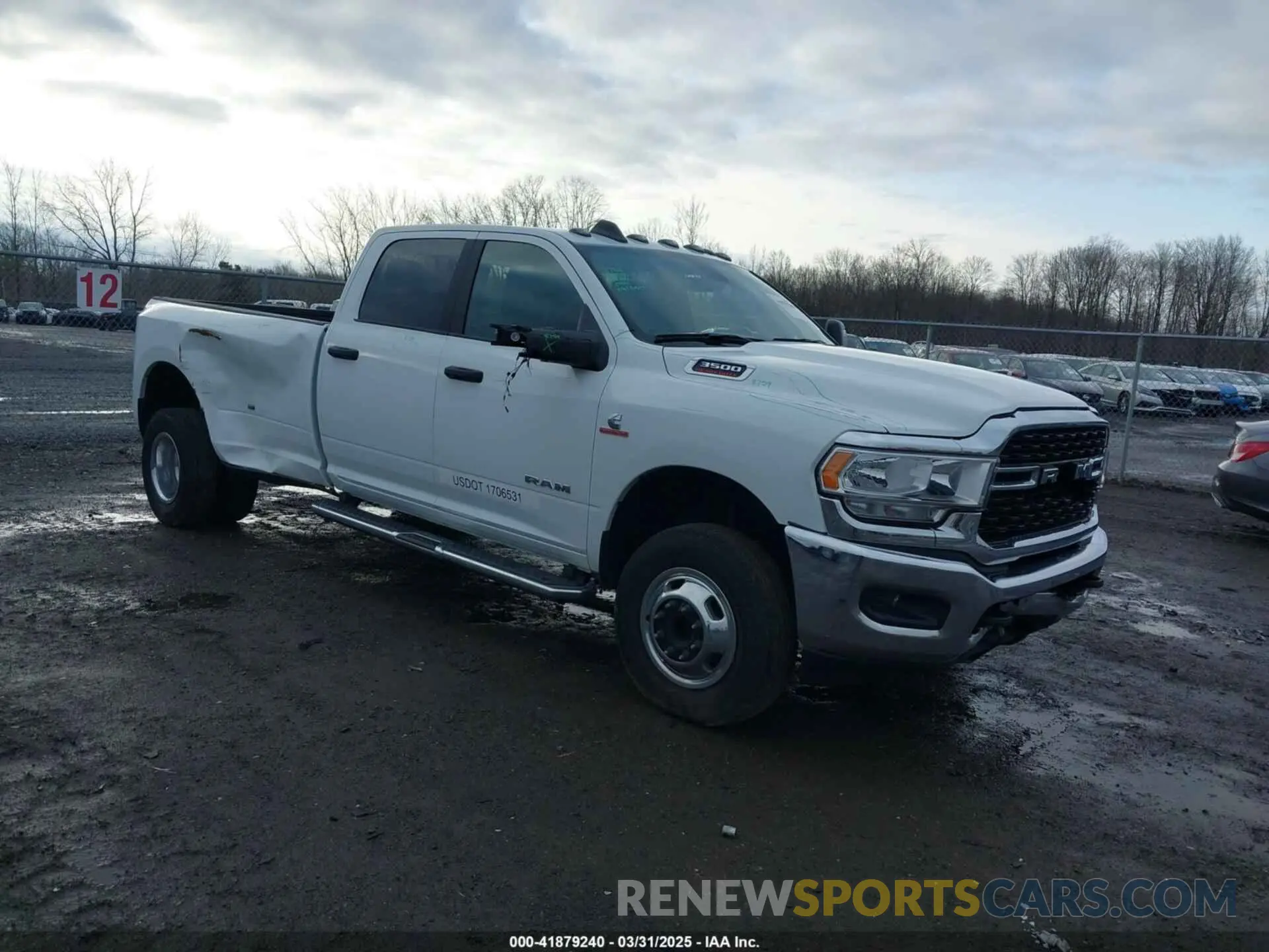 1 Photograph of a damaged car 3C63RRHL1RG307697 RAM 3500 2024