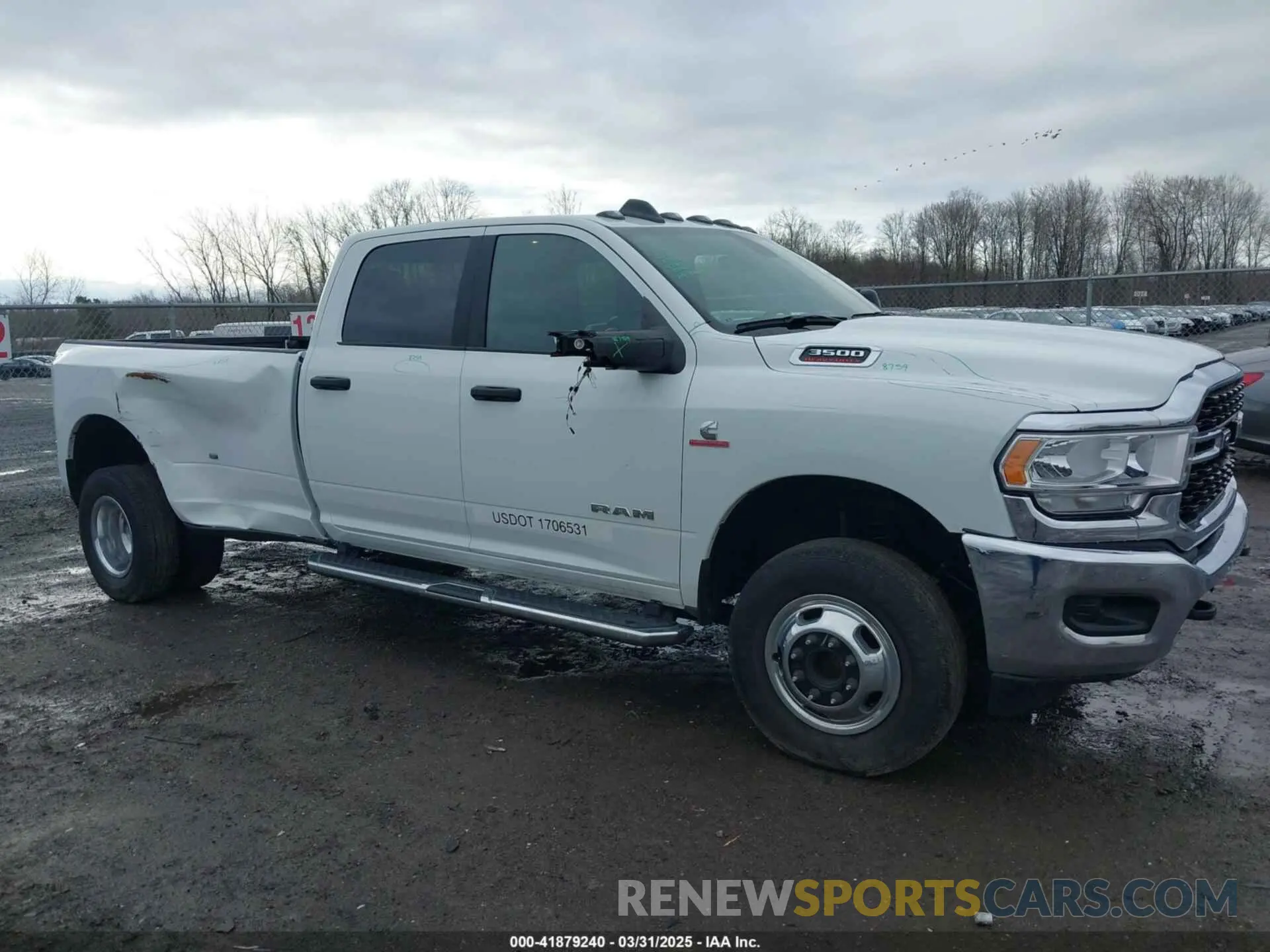 11 Photograph of a damaged car 3C63RRHL1RG307697 RAM 3500 2024