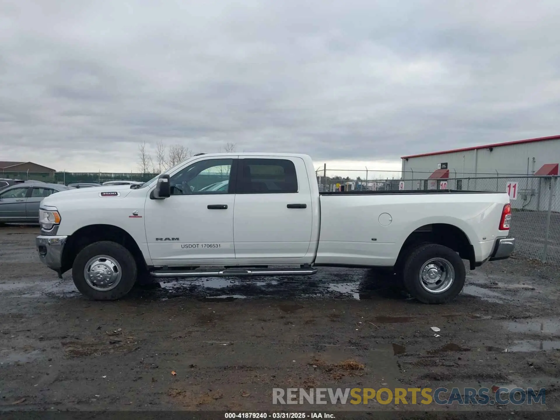 14 Photograph of a damaged car 3C63RRHL1RG307697 RAM 3500 2024