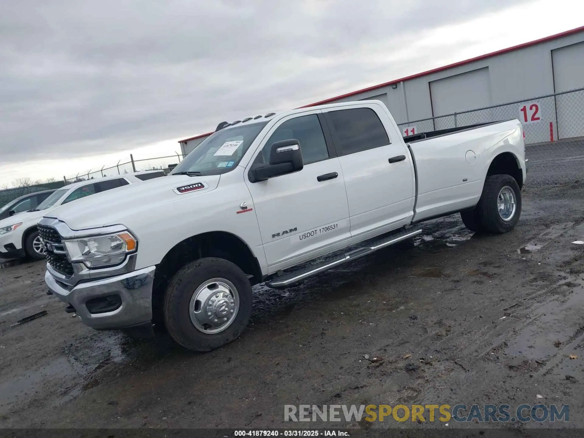 2 Photograph of a damaged car 3C63RRHL1RG307697 RAM 3500 2024