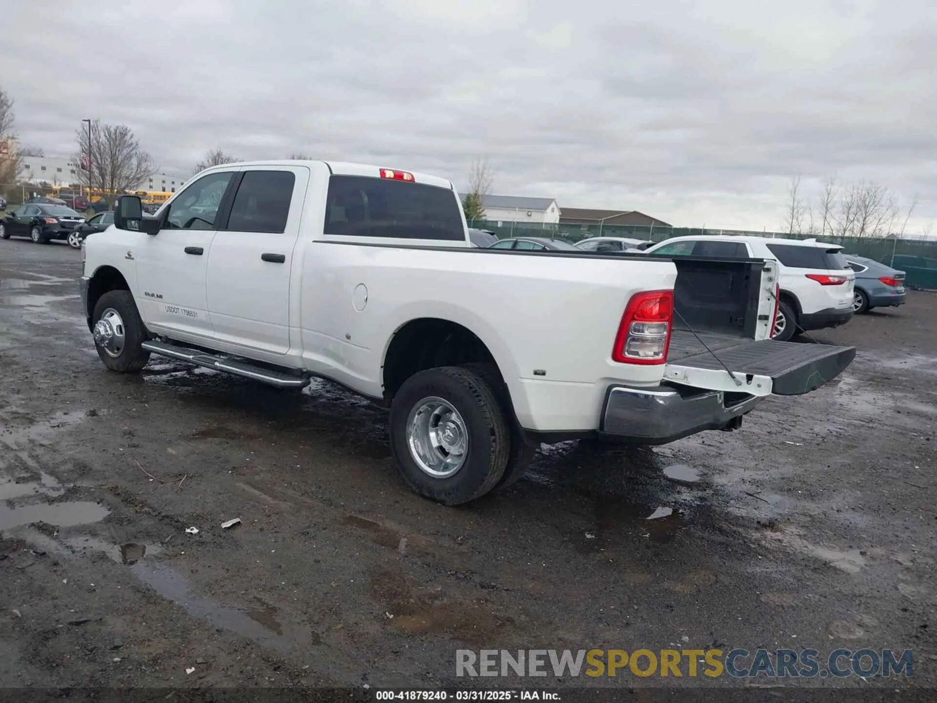3 Photograph of a damaged car 3C63RRHL1RG307697 RAM 3500 2024