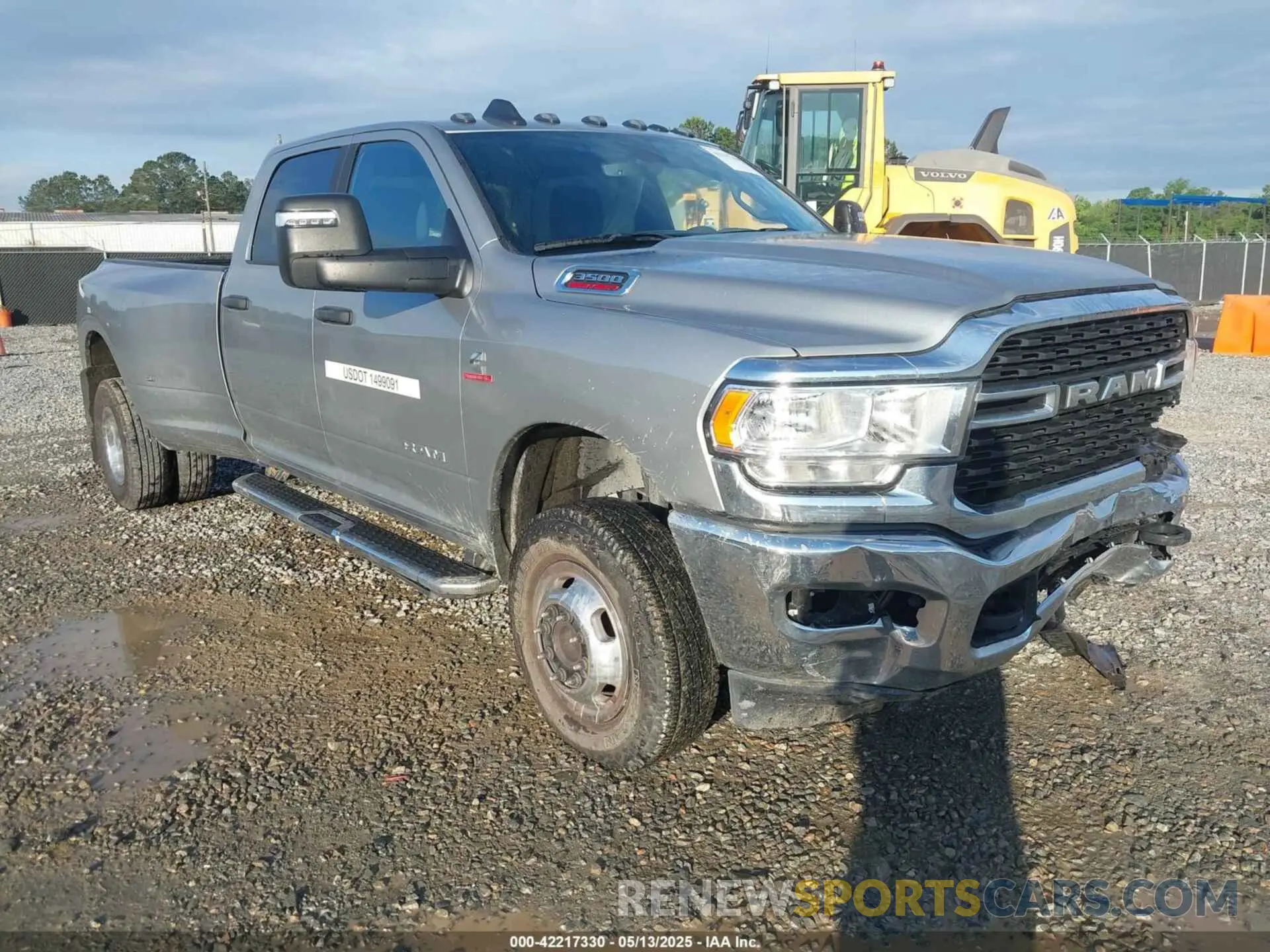1 Photograph of a damaged car 3C63RRHL1RG337184 RAM 3500 2024