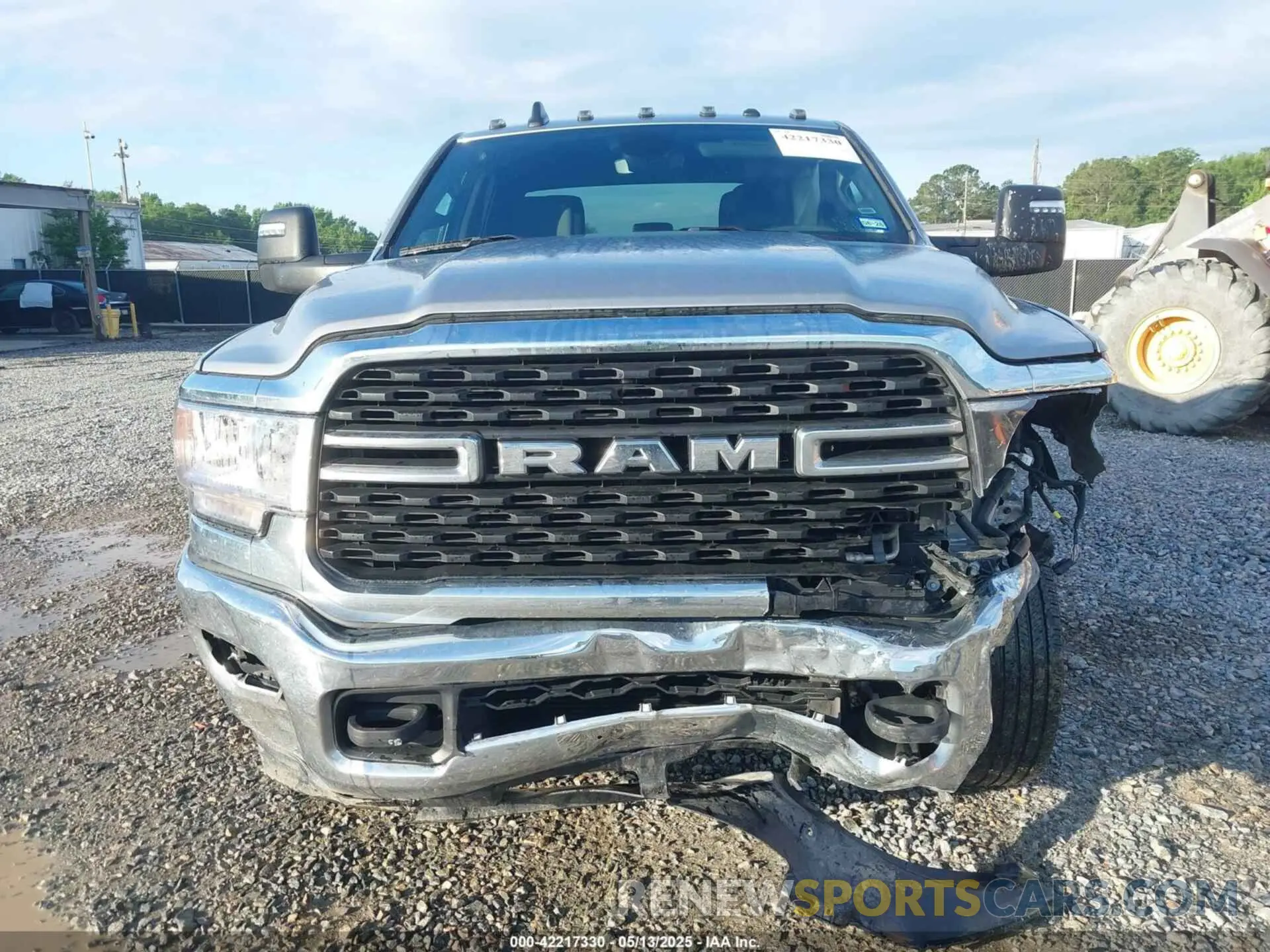12 Photograph of a damaged car 3C63RRHL1RG337184 RAM 3500 2024