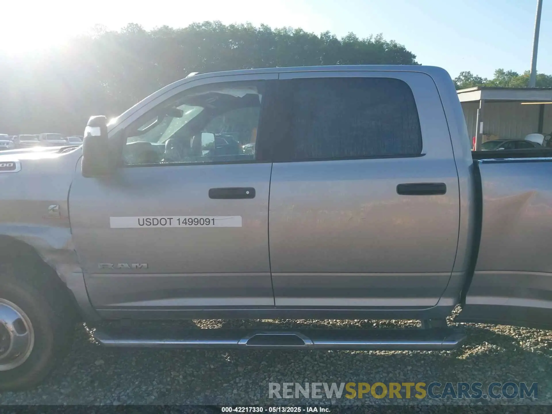 14 Photograph of a damaged car 3C63RRHL1RG337184 RAM 3500 2024