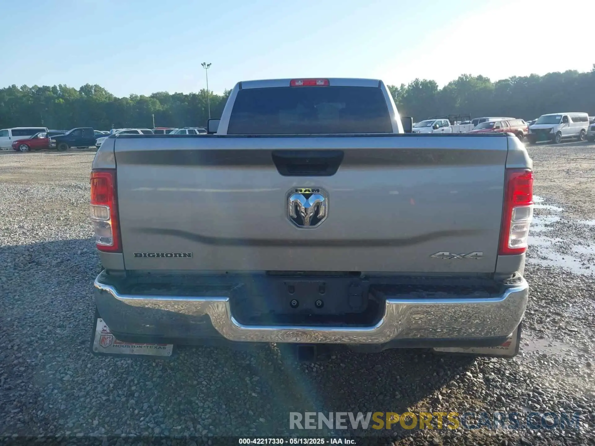 15 Photograph of a damaged car 3C63RRHL1RG337184 RAM 3500 2024